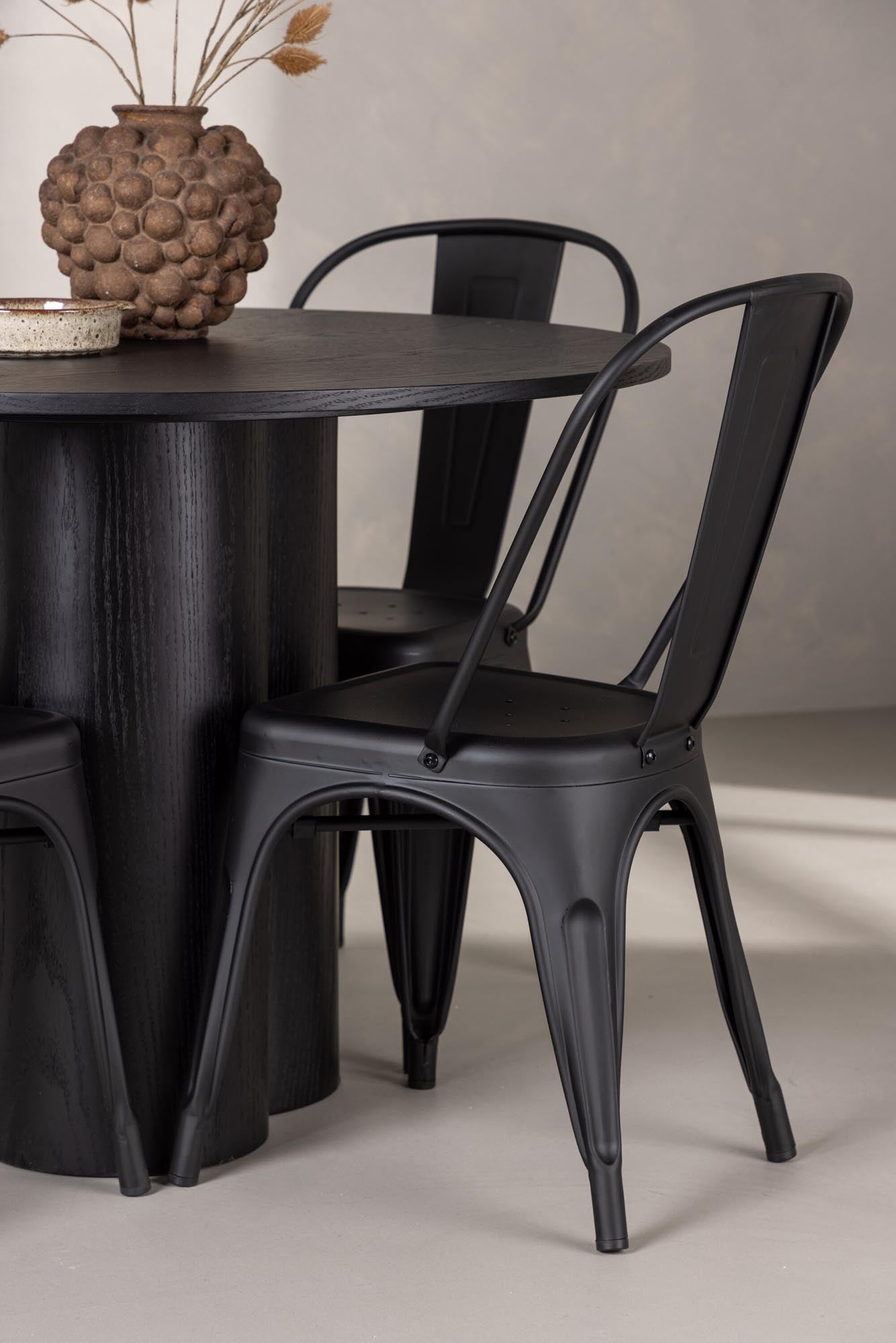 Modernes Esszimmer Set Olivia: Eleganter Tisch mit pflegeleichter MDF-Oberfläche, stabile Stahlbeine und ergonomische Tempe-Stühle aus Holz und Metall.