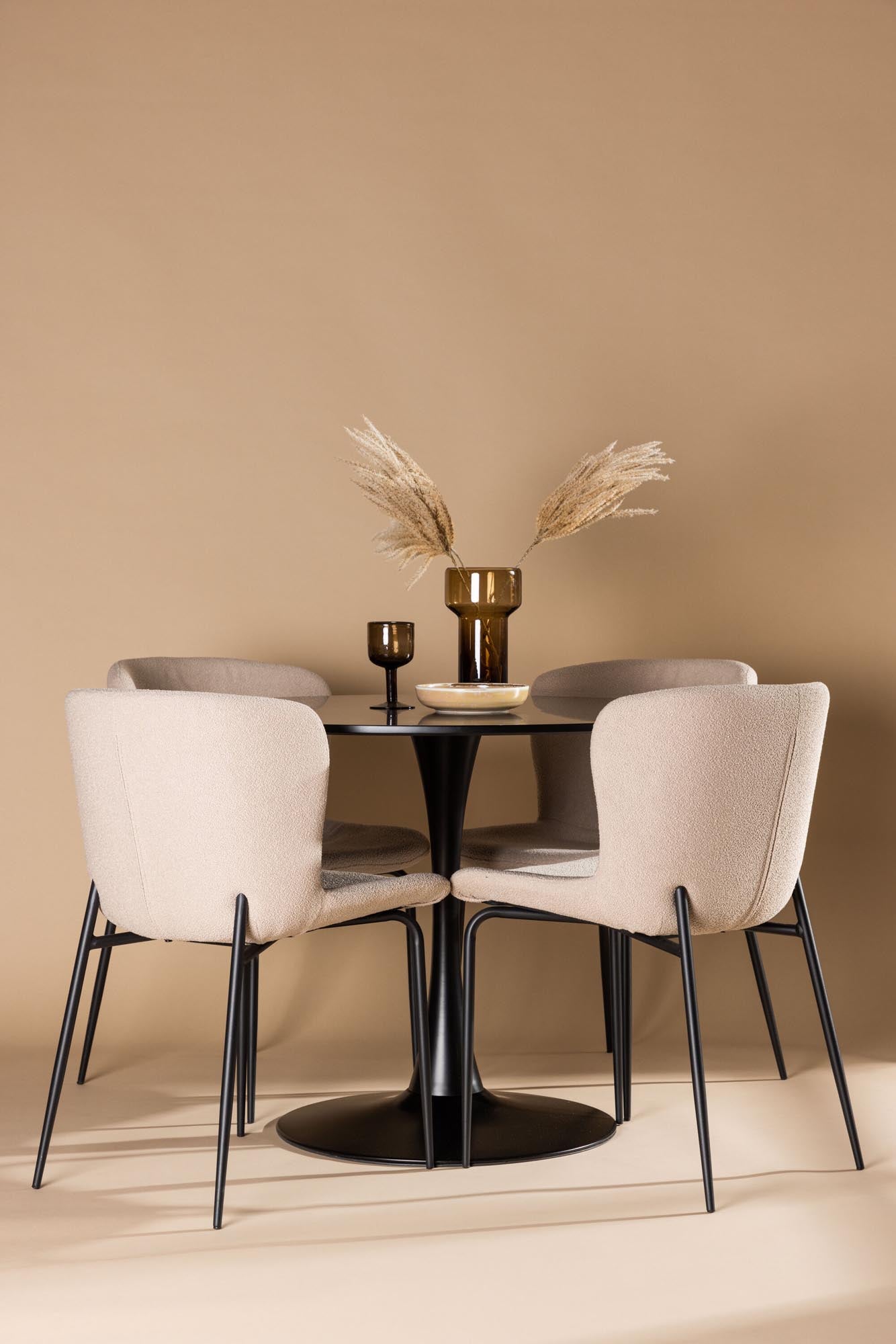 Entdecken Sie das Glade Esszimmerset von Venture Home: Moderner runder Tisch mit schwarzem Stahlfuss und stilvollen grauen Stühlen für gesellige Abende.