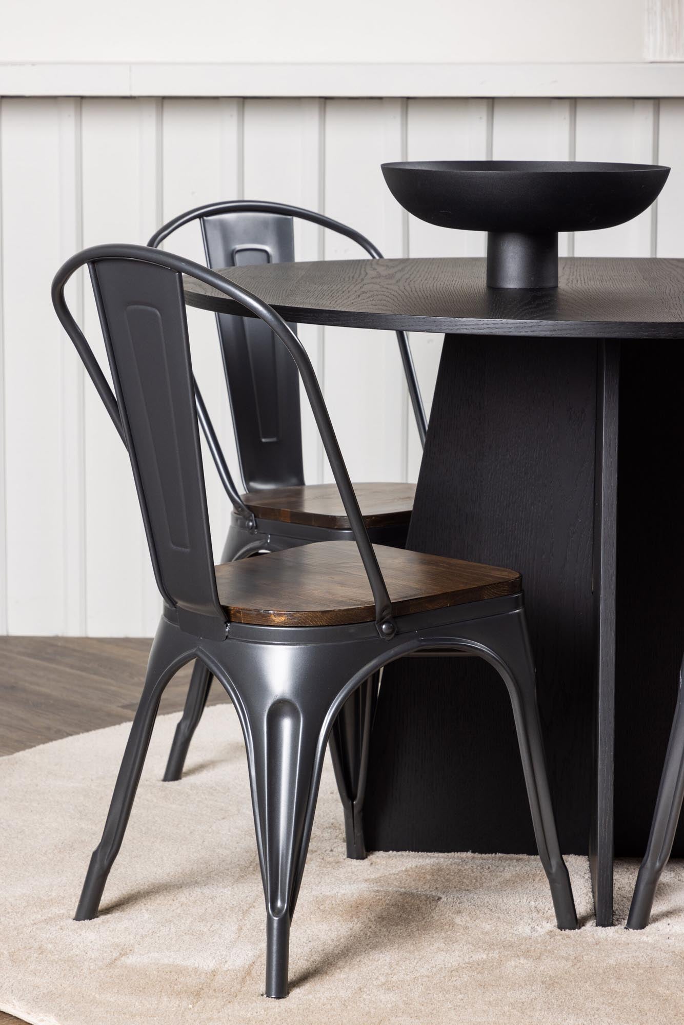 Elegantes Bootcut Esszimmerset mit runden Tempe Tisch (⌀110cm) und 4 stilvollen Stühlen. Ideal für gesellige Abende und modernes Wohnen.