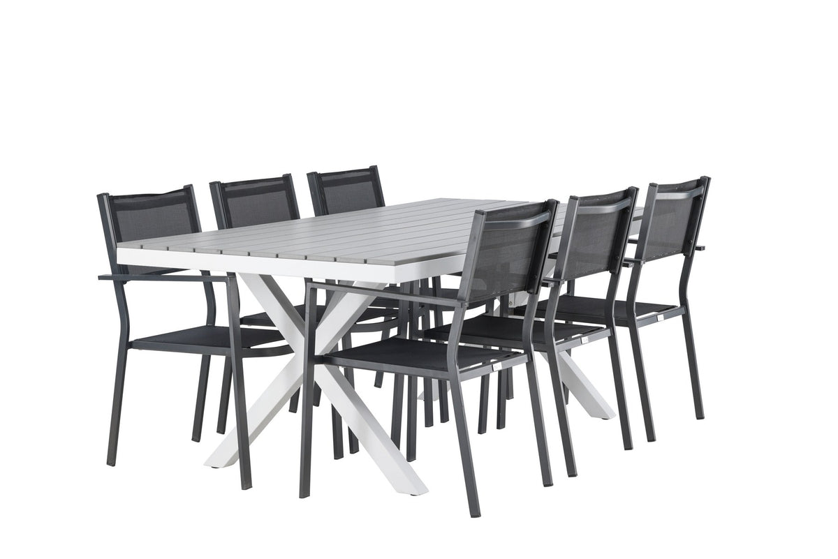 Rechteckiger Gartentisch Garcia mit Aluminiumgestell und Aintwood-Platte, umgeben von sechs stapelbaren Copacabana-Stühlen mit Textilene-Sitzfläche.