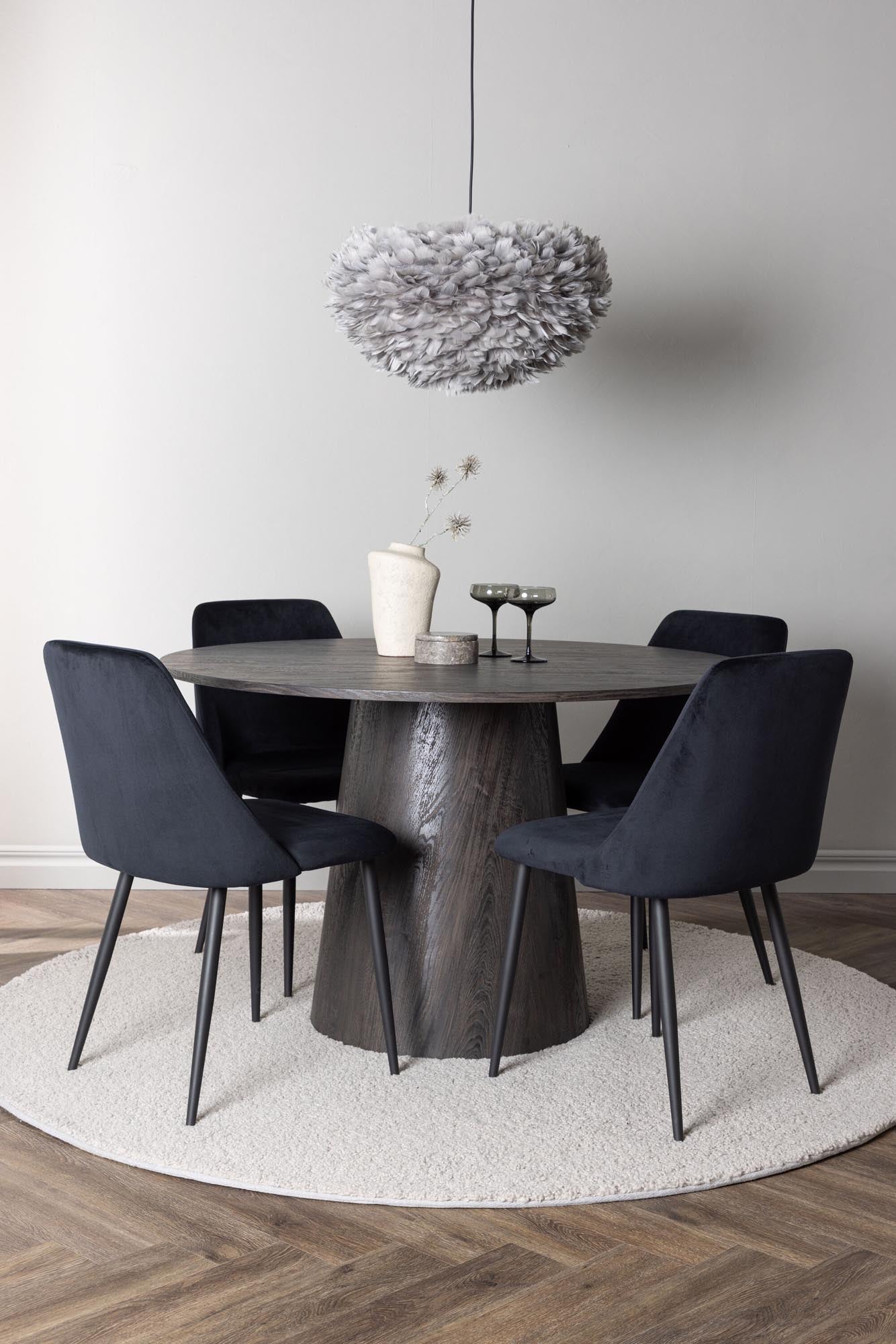 Lanzo Esszimmerset + Night: Elegantes Set mit runden Tisch und komfortablen Samtstühlen für stilvolle Esszimmermomente.