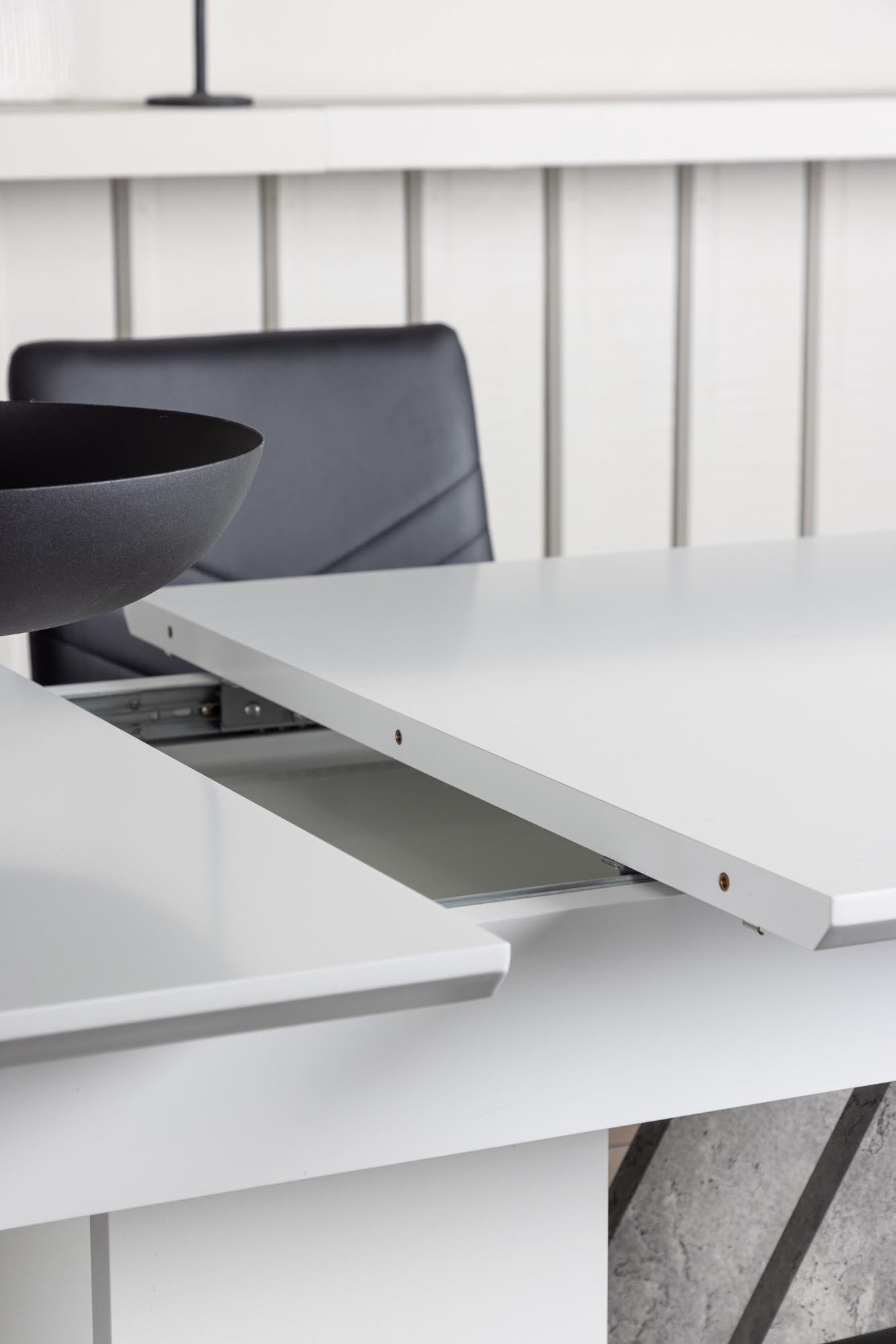 Stilvolles Disa Esszimmerset mit ausziehbarem Tisch und 4 Stühlen.