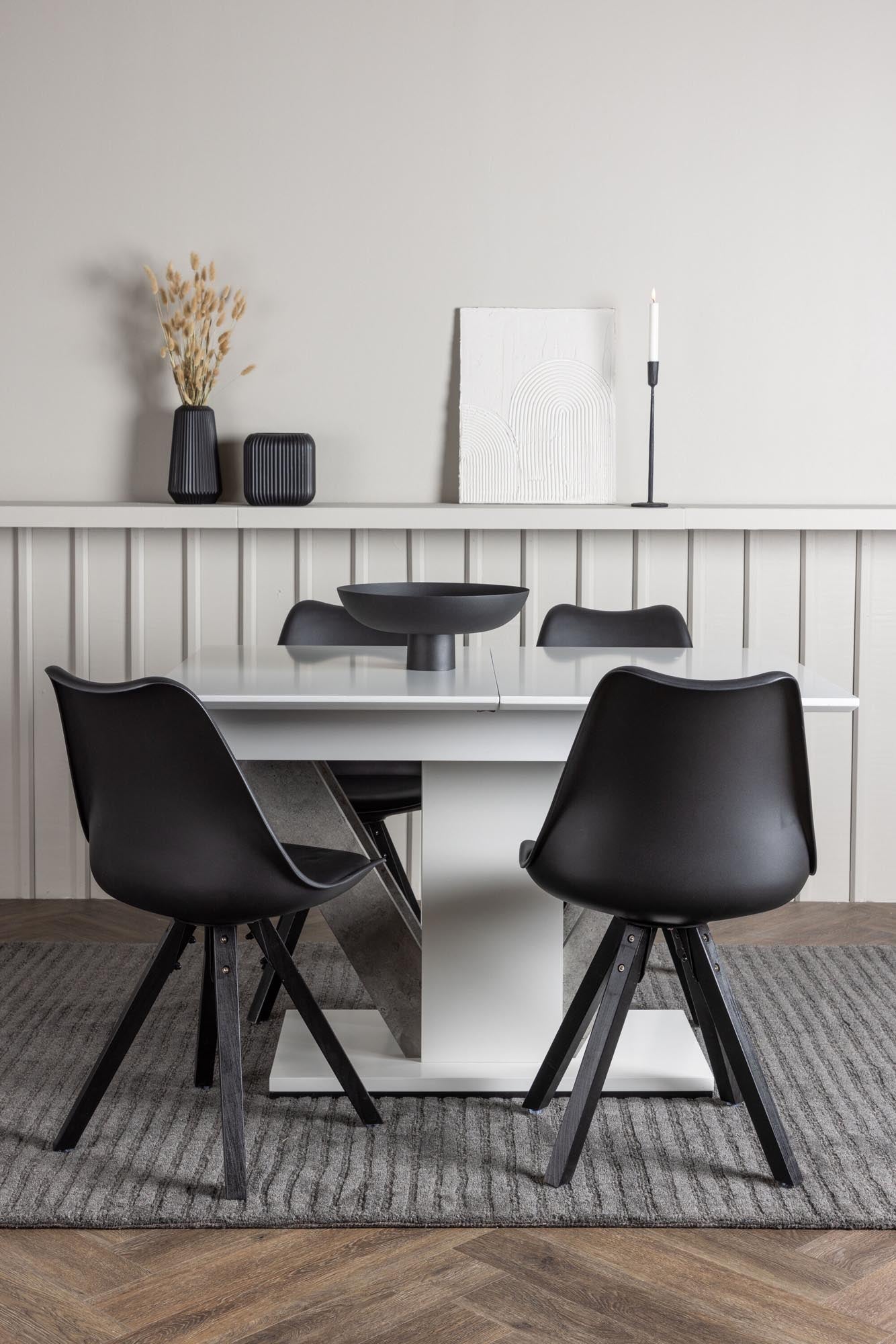 Elegantes Disa Esszimmerset: Ausziehbarer Tisch, bequeme Zeno Stühle, modernes Design, ideal für stilvolle Dinner.