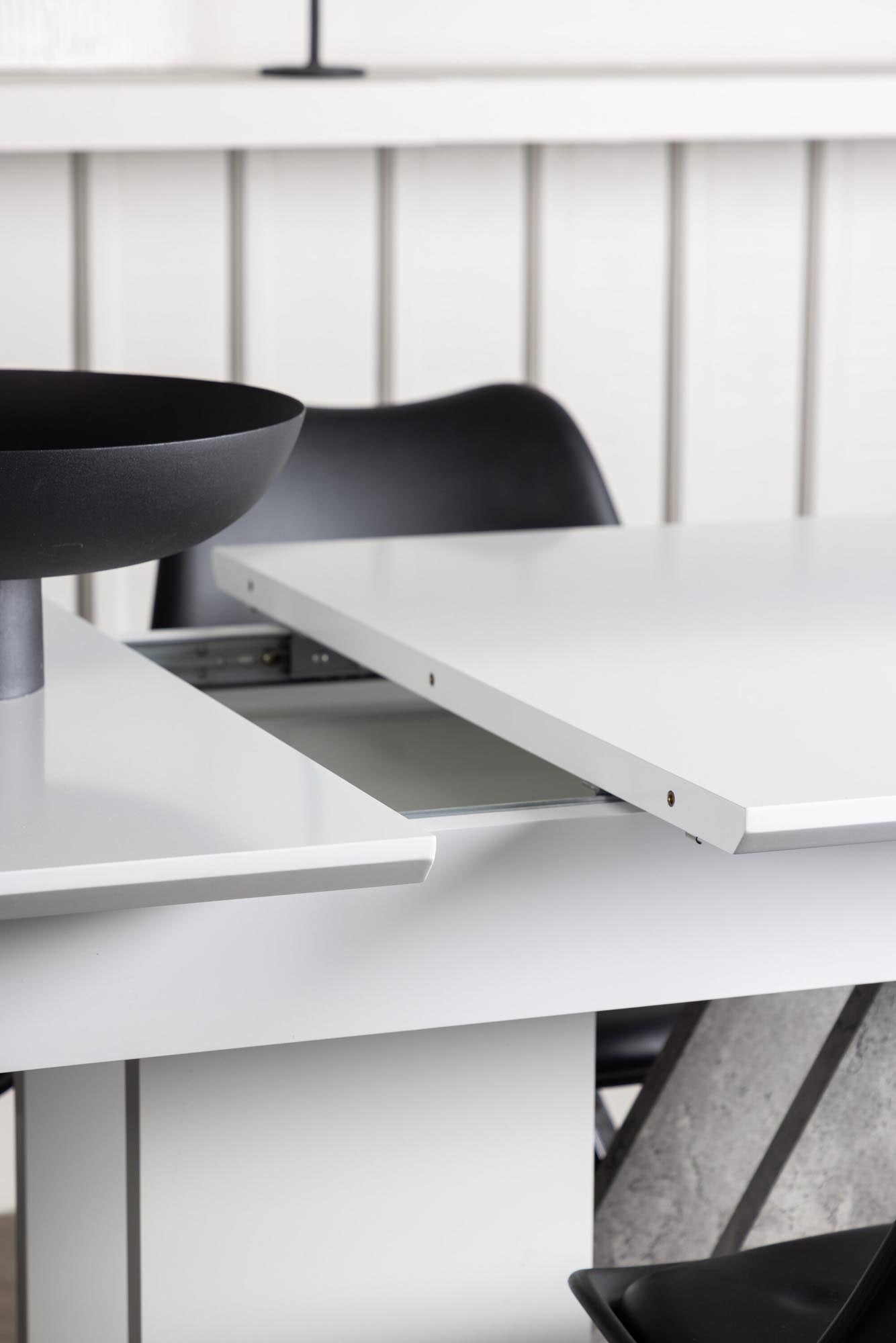 Modernes Disa Esszimmerset mit ausziehbarem Tisch und 4 bequemen Zeno-Stühlen. Ideal für stilvolle Esszimmergestaltung und gesellige Abende.