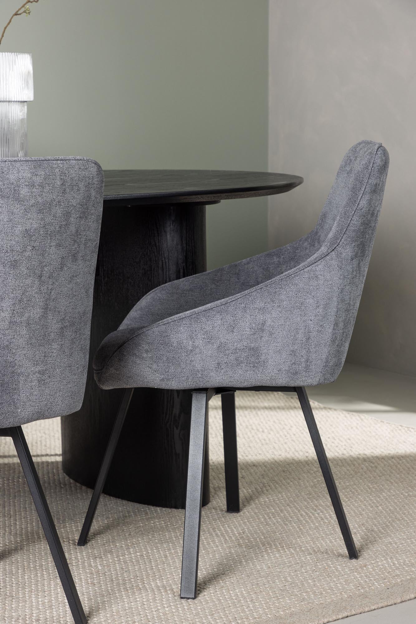 Stilvolles Isolde Esstischset mit ovalem 180cm Tisch und 4 komfortablen Rosie-Stühlen. Hochwertige Materialien für ein modernes Esszimmer.