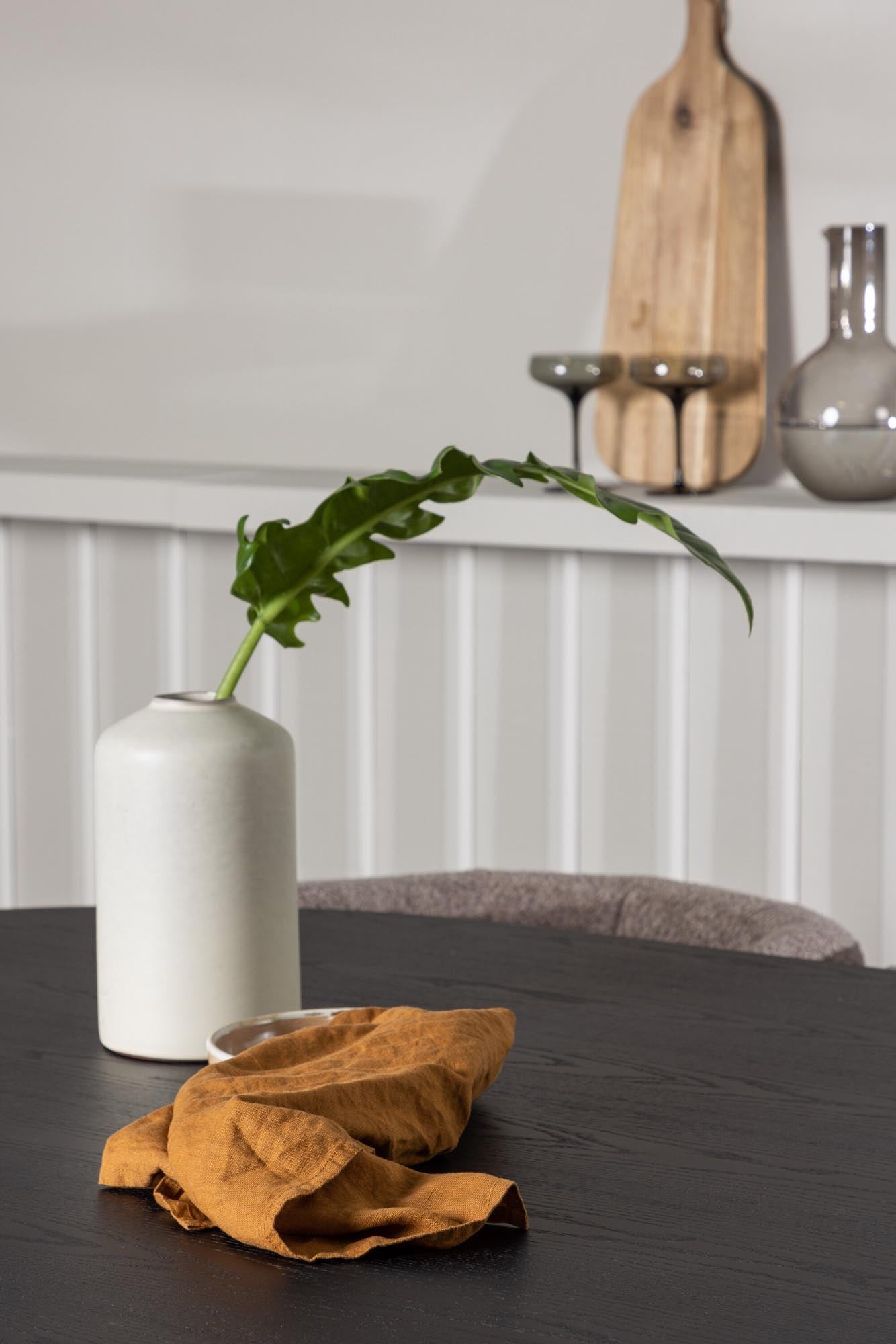 Elegantes Bootcut Esszimmerset mit ovalem Tisch und 6 komfortablen Stühlen. Ideal für gesellige Abende und modernes Wohnen.