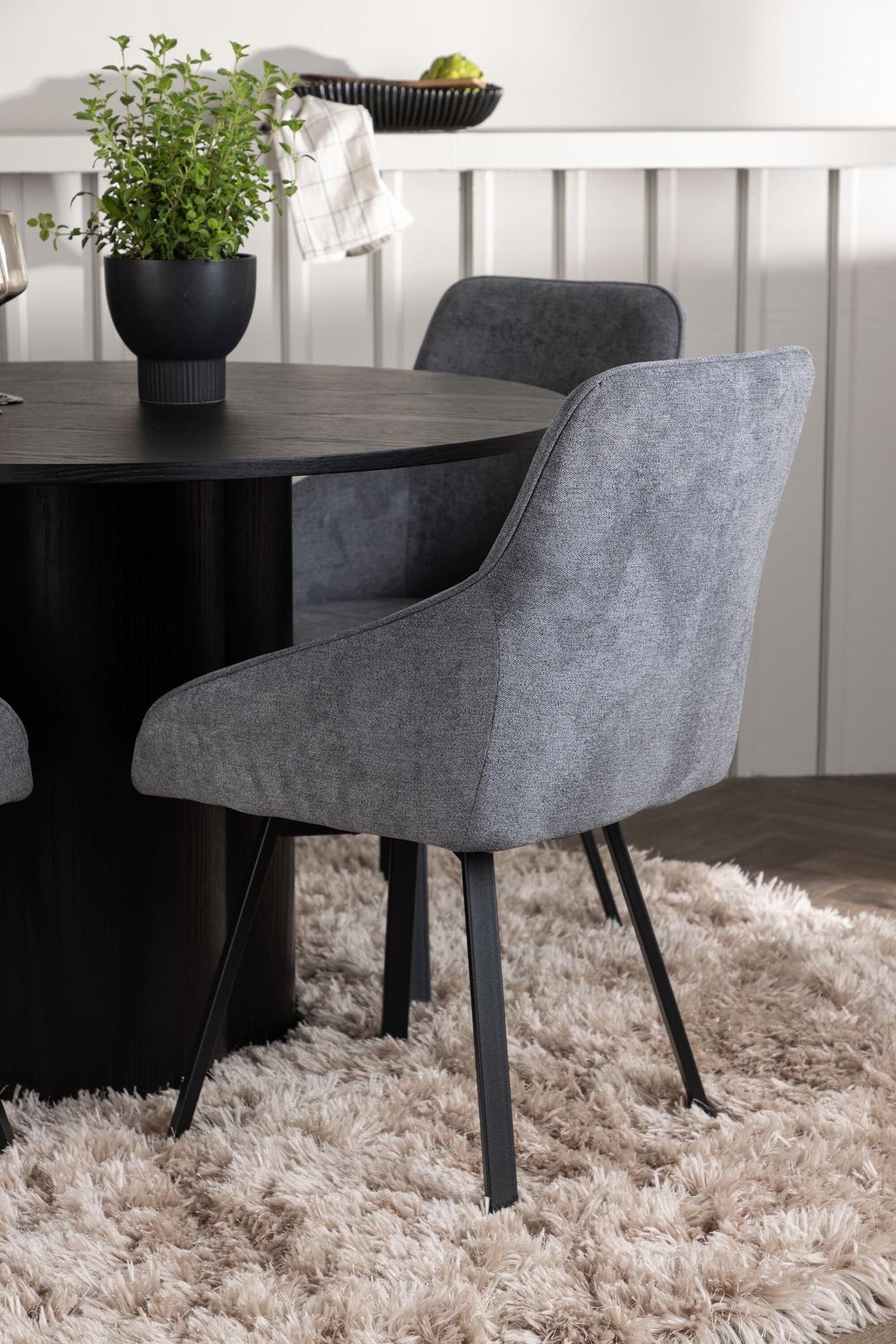 Modernes Olivia Esszimmerset mit rundem Rosie Tisch und 4 Stühlen.