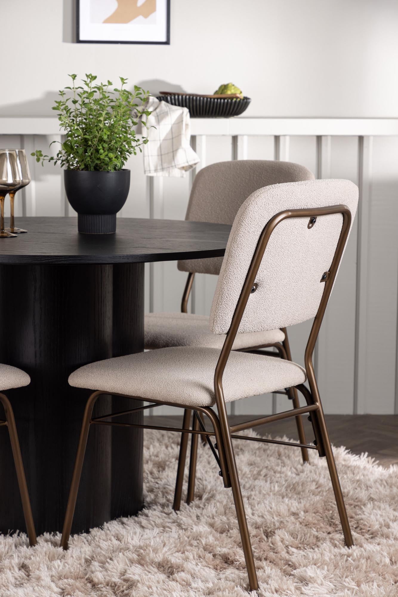 Modernes Esszimmerset mit runden Tisch (⌀110cm) und 4 ergonomischen Stühlen, ideal für gemütliche Mahlzeiten und stilvolle Einrichtung.