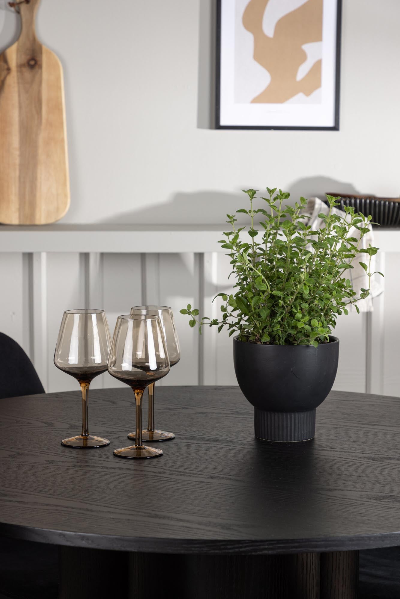 Modernes Esszimmerset Olivia mit runder Tischplatte (110 cm) und 4 ergonomischen Stühlen. Perfekt für gesellige Momente und stilvolle Einrichtung.