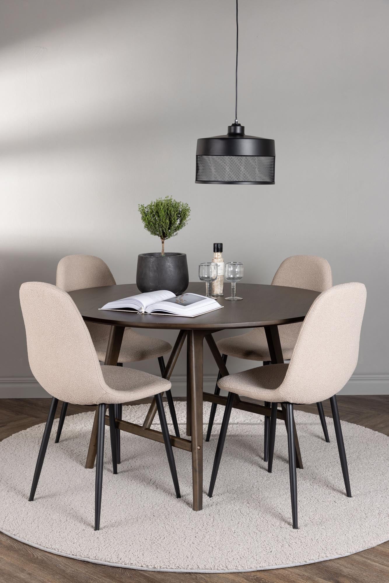 Stilvolles Esszimmerset Kaseindon mit runden 100 cm Tisch und 4 eleganten Polar-Stühlen. Perfekt für gesellige Abende und festliche Anlässe.