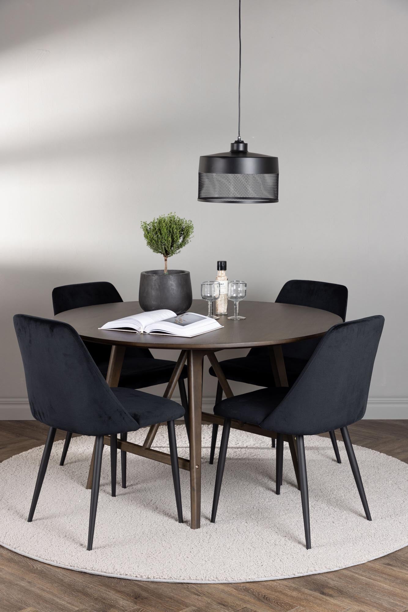 Modernes Esszimmerset: Runder Tisch aus Walnuss mit 4 eleganten Samtstühlen. Ideal für stilvolle Essbereiche und gesellige Abende.