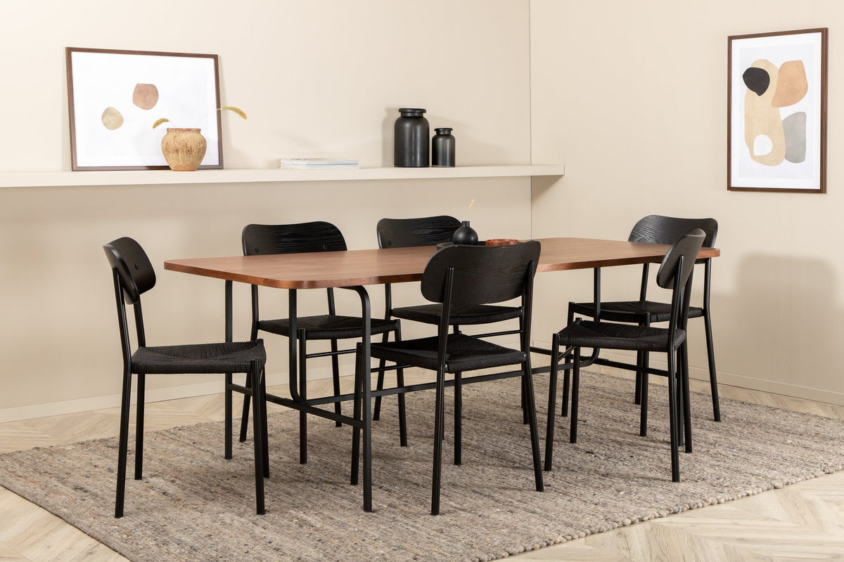 Esszimmer Set Uno mit Stuhl Polly: rechteckiger Tisch mit Walnuss-Furnierplatte und schwarzem Metallgestell, sechs Stühle mit schwarzem Seilsitz.