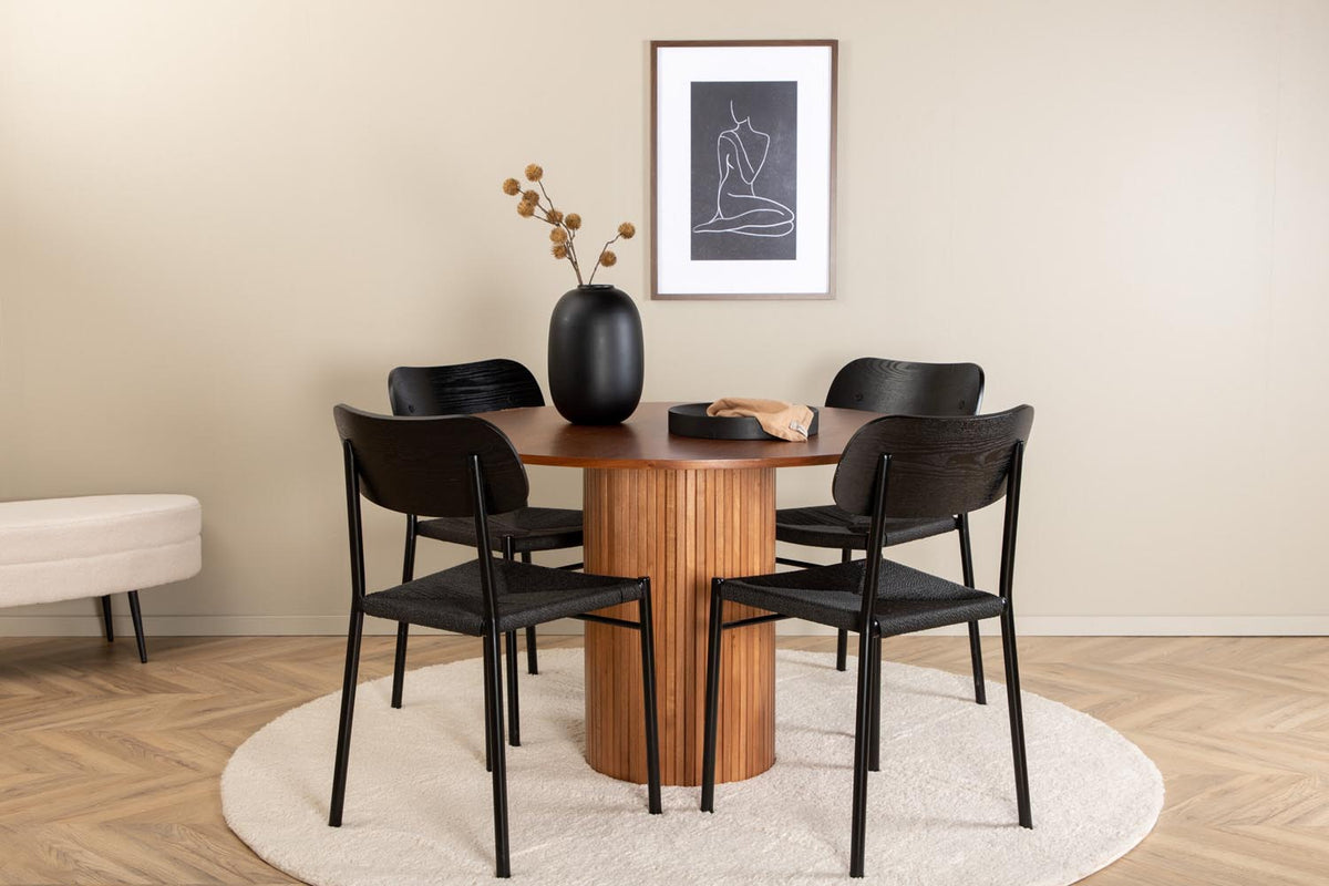 Rundes Esszimmerset Bianca mit Stuhl Polly: Tisch aus MDF und Furnier in Walnuss, vier schwarze Stühle mit Metallbeinen und Seilsitzen.