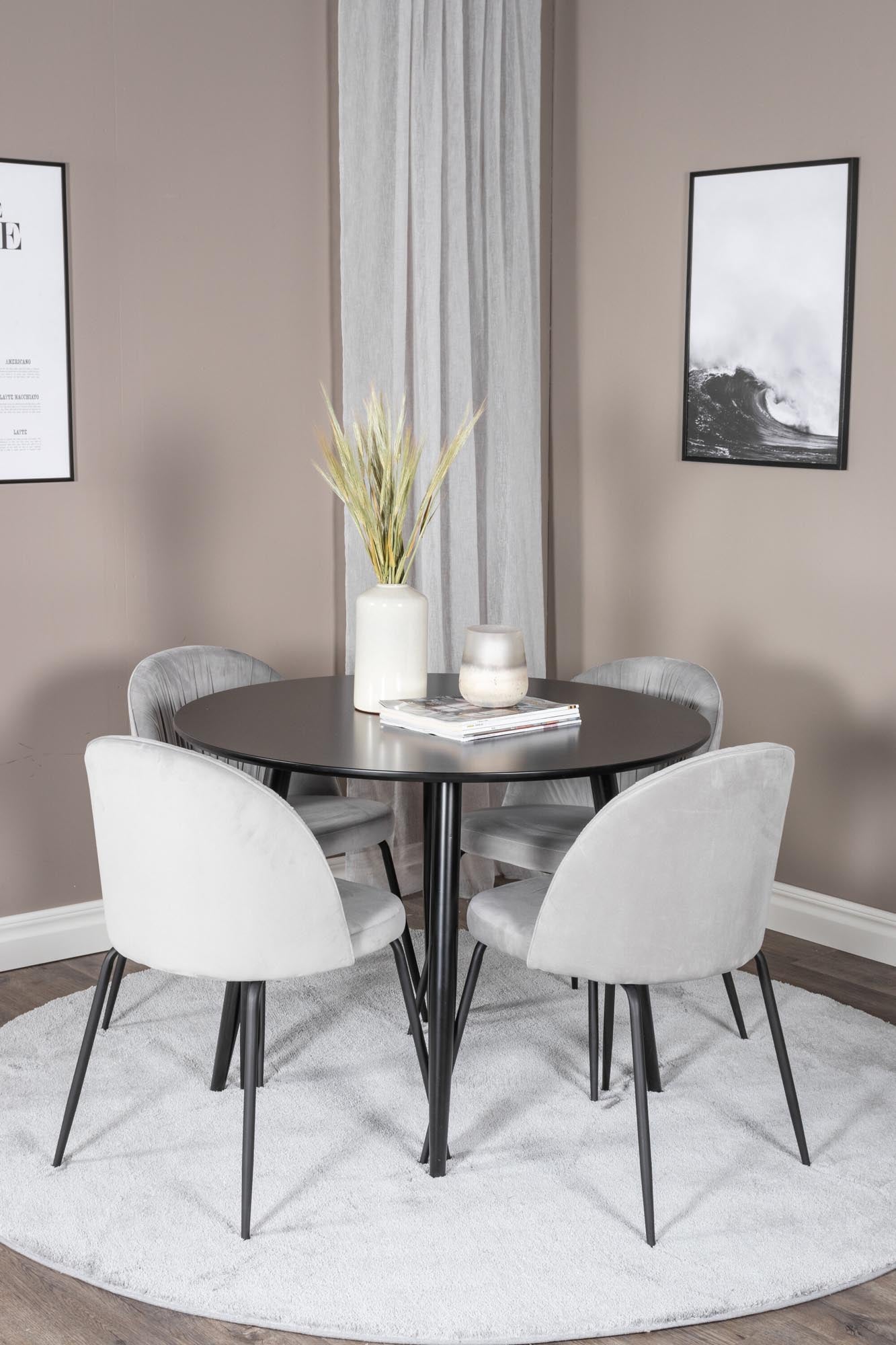 Elegantes Esszimmer Set Plaza mit stilvollen Wrinkles-Stühlen.