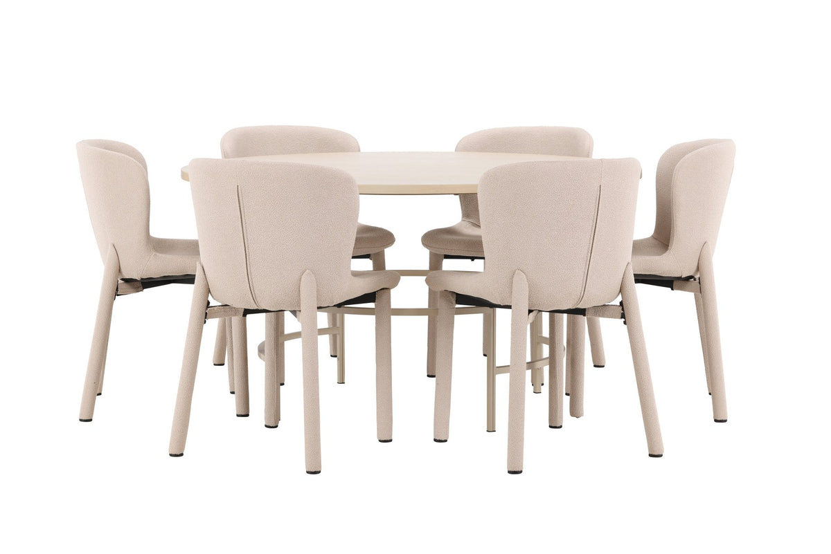Runder Esstisch Copenhagen aus MDF in White Wash mit sechs Astoria-Stühlen aus Metall mit beiger Bouclé-Polsterung im Esszimmer.