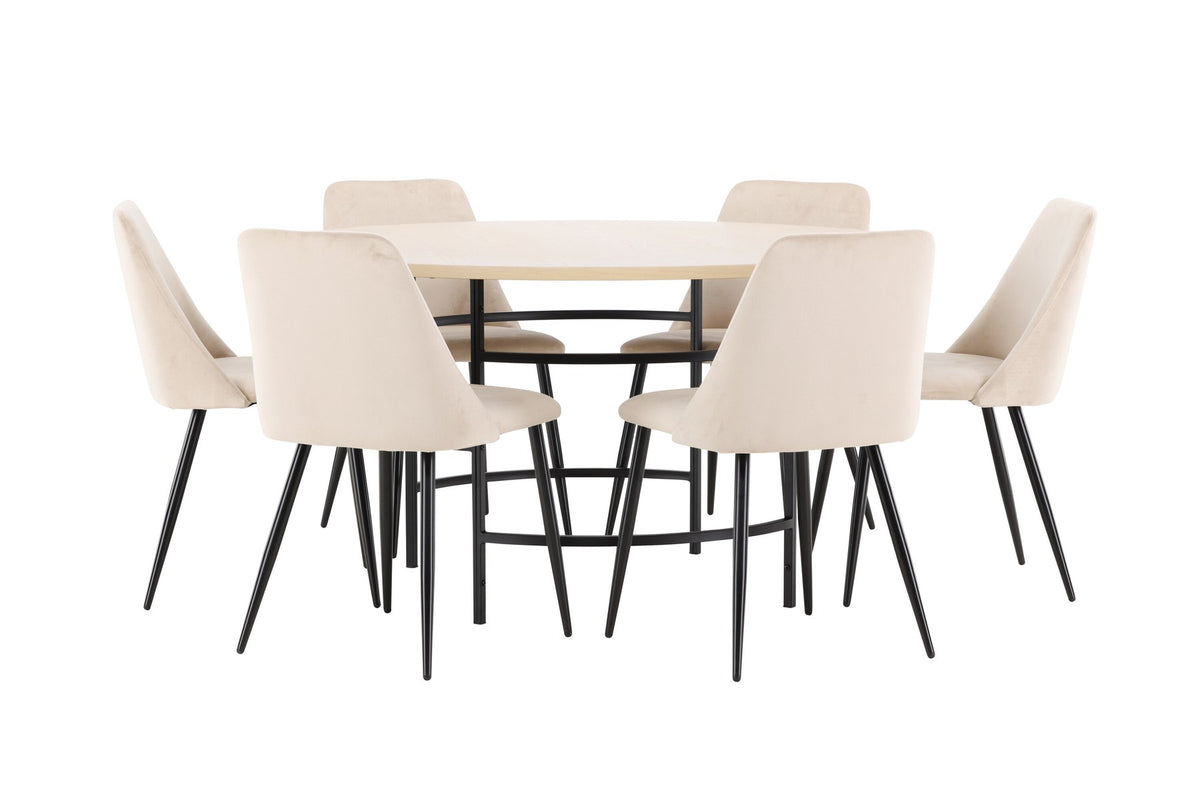 Rundes Esszimmerset Copenhagen mit Nachtstuhl von Venture Home: Tisch aus MDF in White Wash mit Metallgestell und sechs Samt-Stühlen mit schwarzen Beinen.
