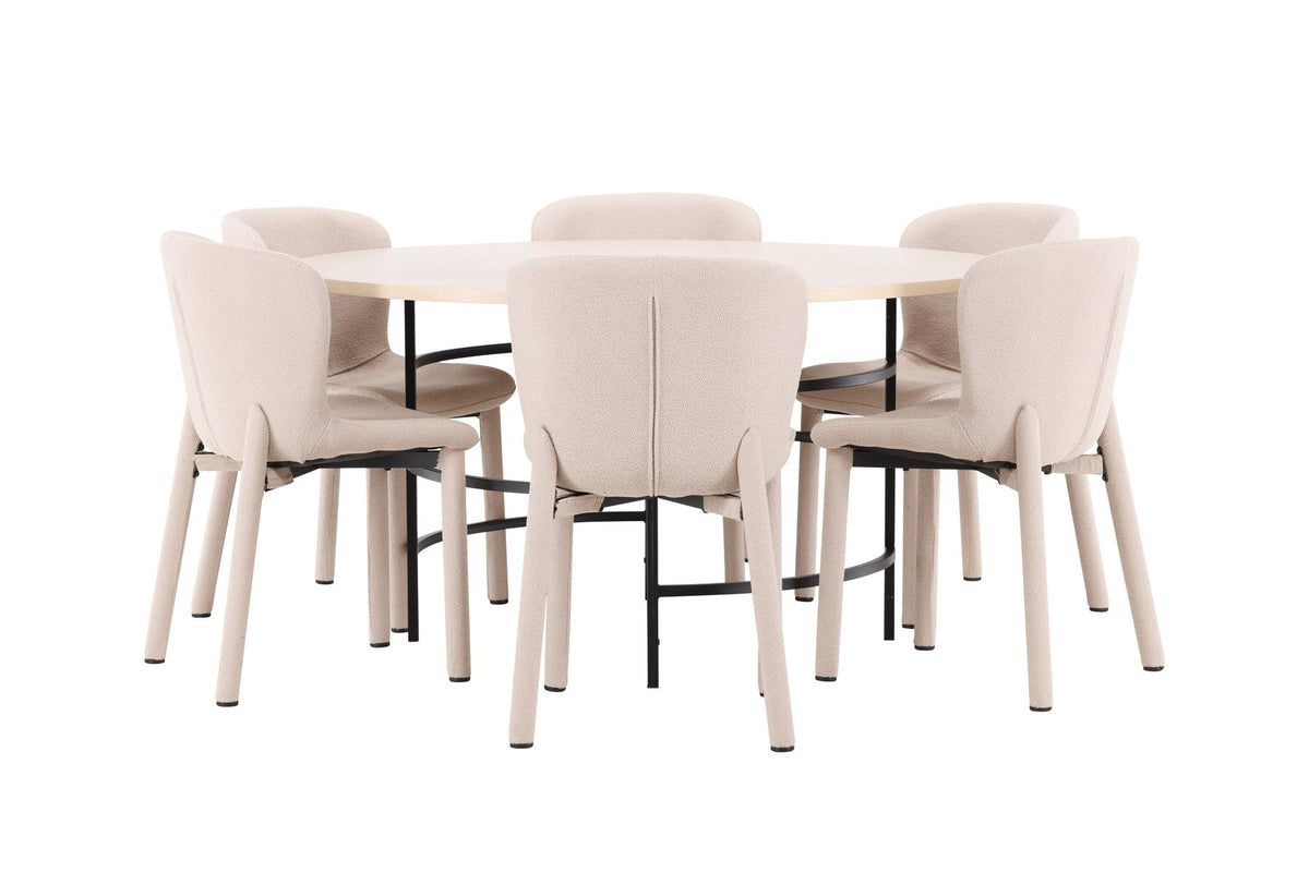 Runder Esstisch Copenhagen aus MDF in White Wash mit sechs Astoria-Stühlen aus Metall mit beiger Bouclé-Polsterung im Esszimmer.