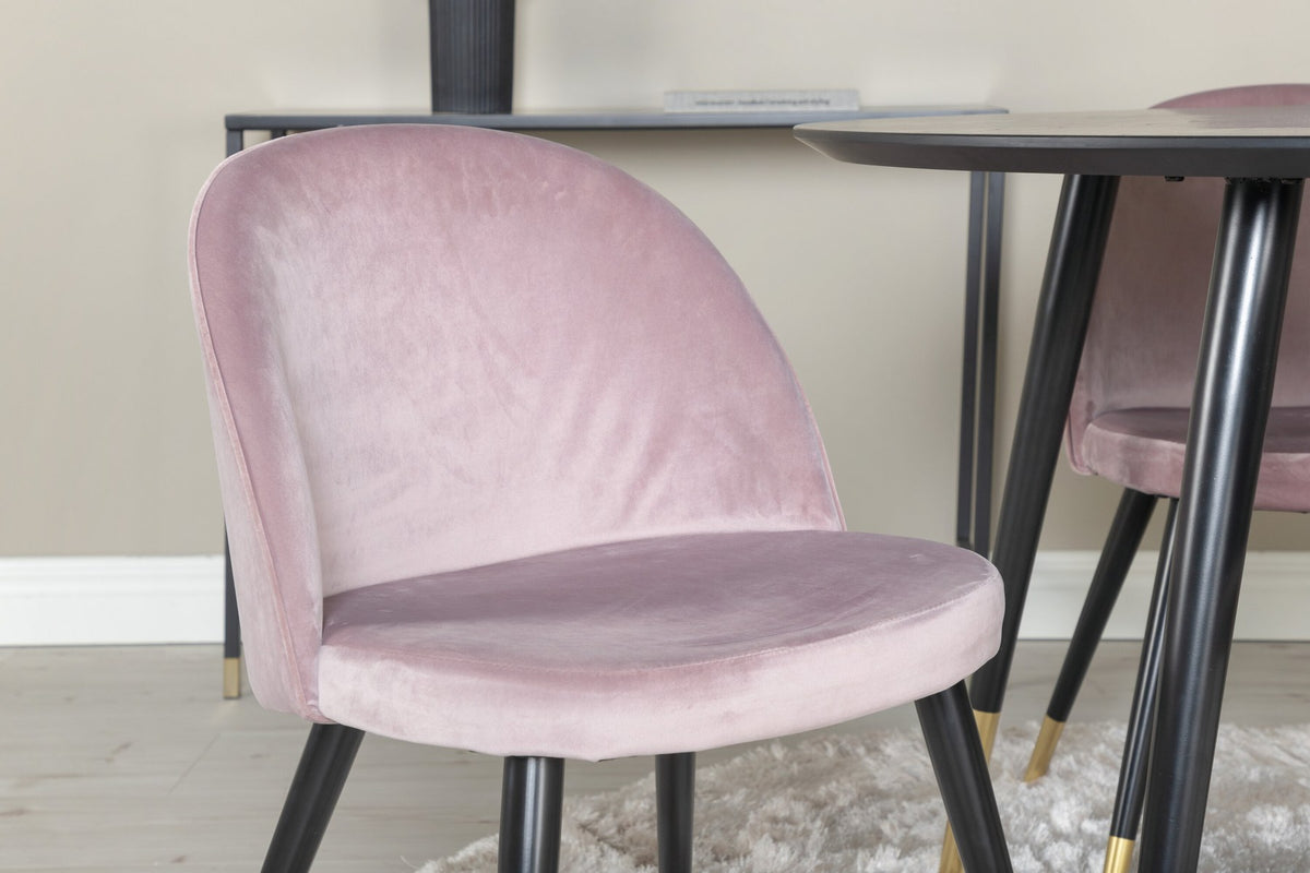 Rundes Dipp Esszimmerset: Esstisch ⌀115 cm mit schwarzem Furnier und schwarzen Beinen, dazu vier Velvet-Stühle mit schwarz-grauem Mikrofaserbezug.