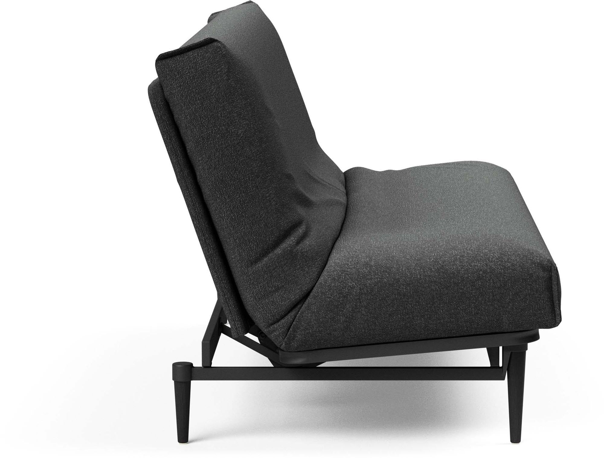 Entdecken Sie das stilvolle Colpus Bettsofa 140 in Eiche schwarz mit Nordic Cover – perfekt für zeitgemässe Einrichtung und gemütliche Nächte.
