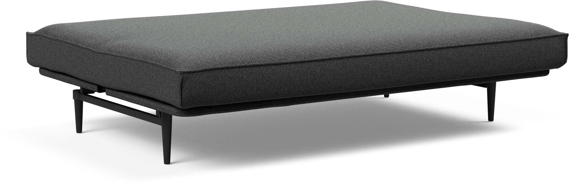 Erleben Sie das Colpus Bettsofa 140 Sharp Plus Cover in stilvollem Schwarz – die ideale Kombination aus Funktionalität und modernem Design für jeden Raum.