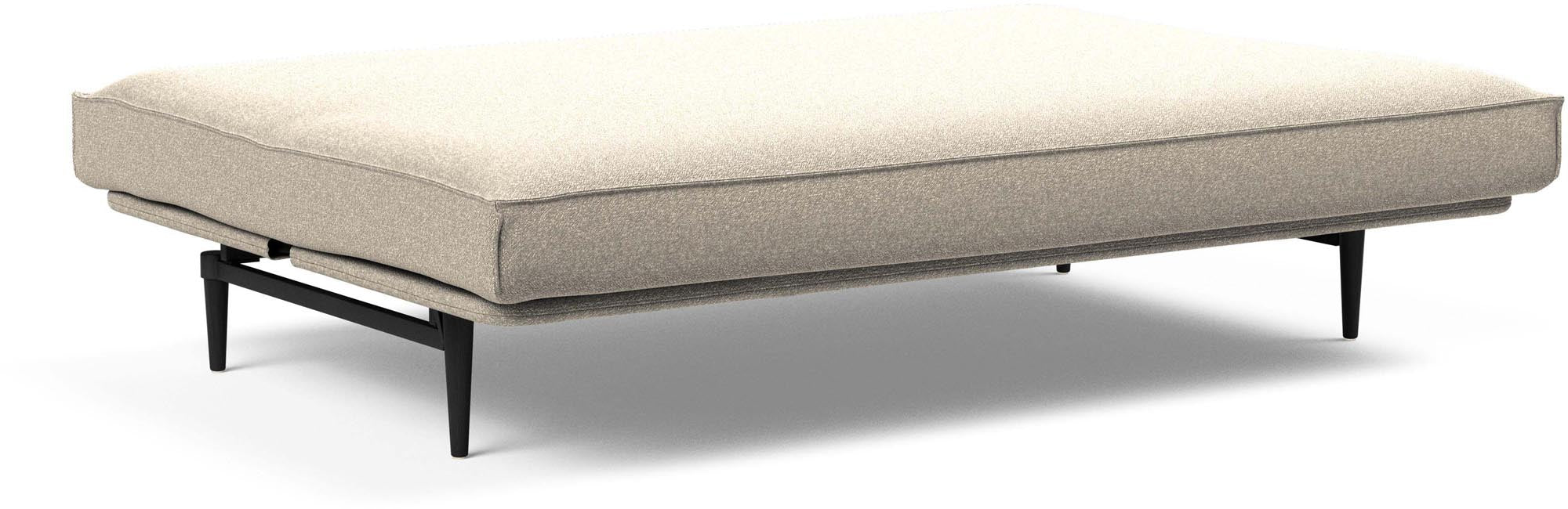 Erleben Sie das Colpus Bettsofa 140 Sharp Plus Cover in stilvollem Schwarz. Ideal für kleine Räume, vereint es Komfort und Eleganz.