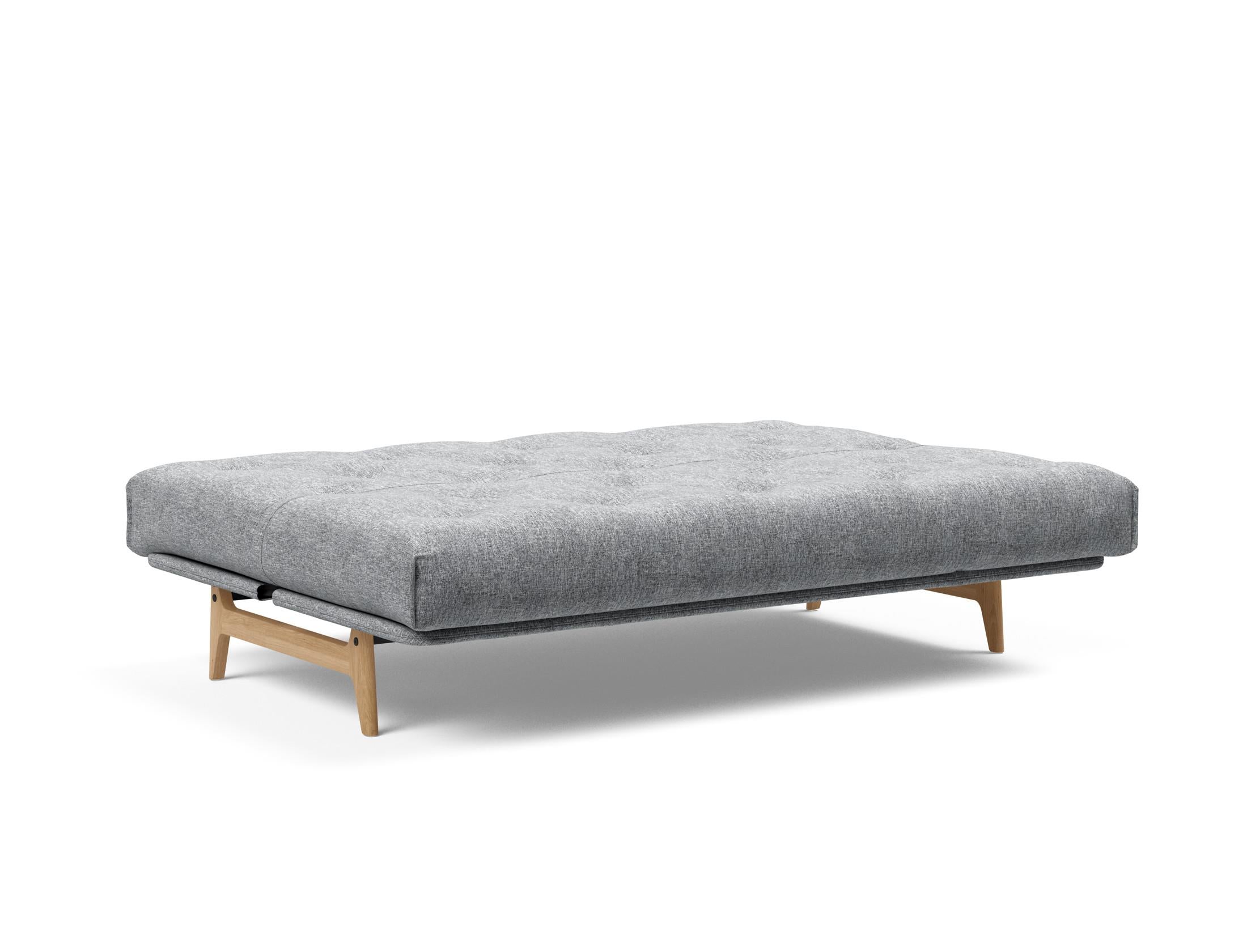 Erleben Sie das Aslak 140 Bettsofa Nordic: Multifunktional, umweltfreundlich und mit hochwertiger Matratze für besten Schlafkomfort.