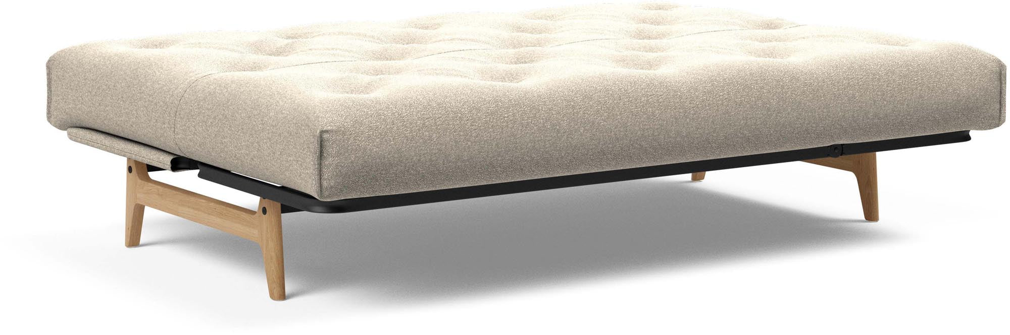 Erleben Sie das Aslak 140 Bettsofa von Innovation Living – modernes Nordic Design trifft auf komfortablen Latex für besten Schlafkomfort.