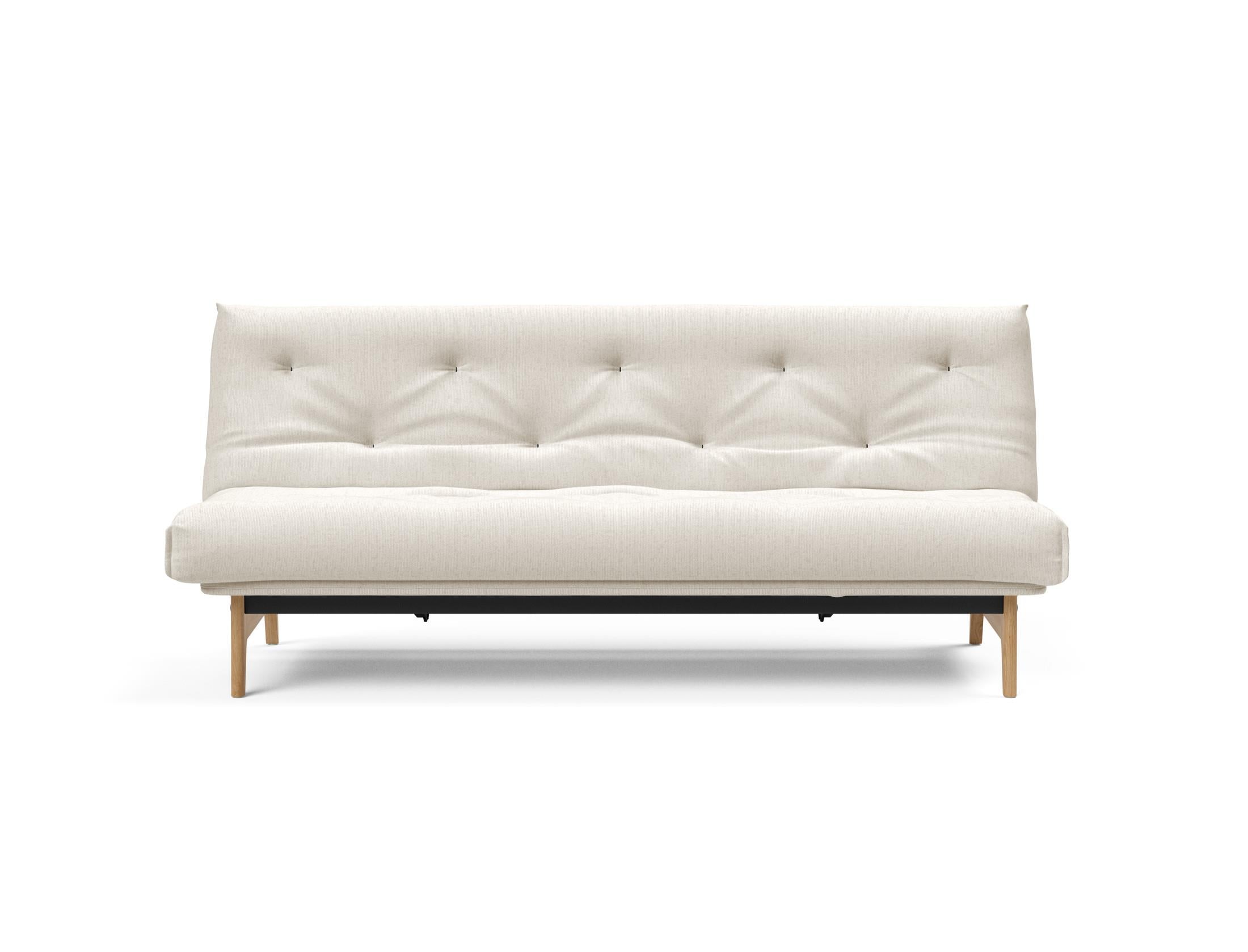 Elegantes Aslak 120 Bettsofa Nordic mit komfortablem Soft Spring Bezug, ideal für stilvolle Wohnräume und gemütliche Stunden.