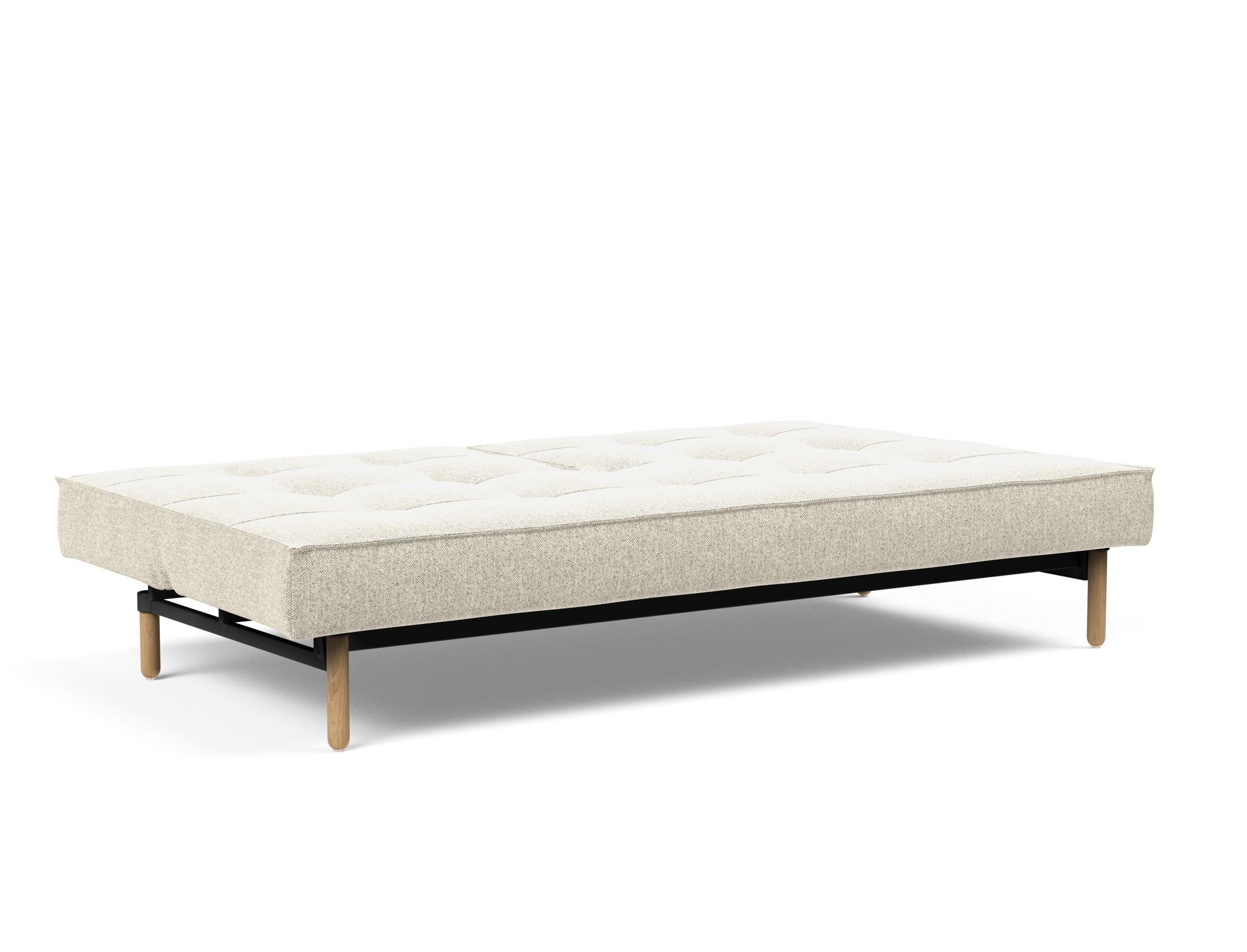 Das Splitback Sofabett 115 Stem von Innovation Living bietet stilvolle Flexibilität und Komfort, ideal für kleine Räume und Übernachtungsgäste.