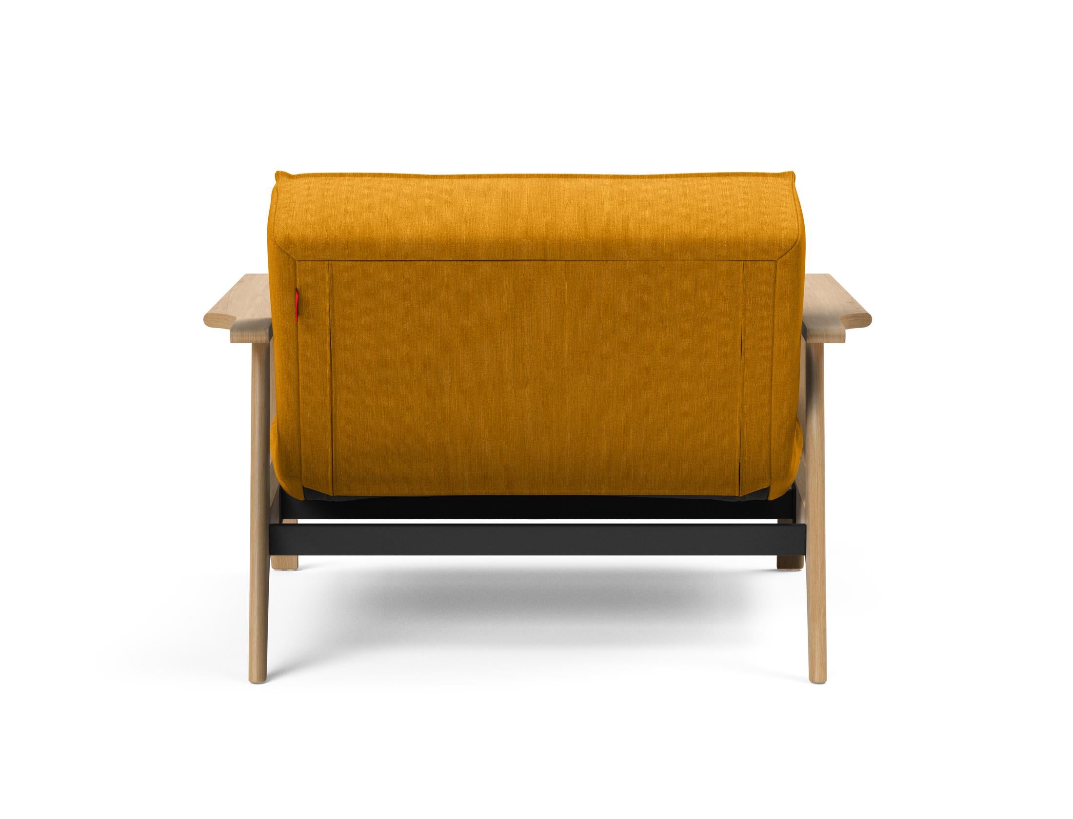 Erleben Sie den Splitback Frej Sessel: modernes dänisches Design, hochwertige Materialien und vielseitige Nutzungsmöglichkeiten für Ihr Zuhause.