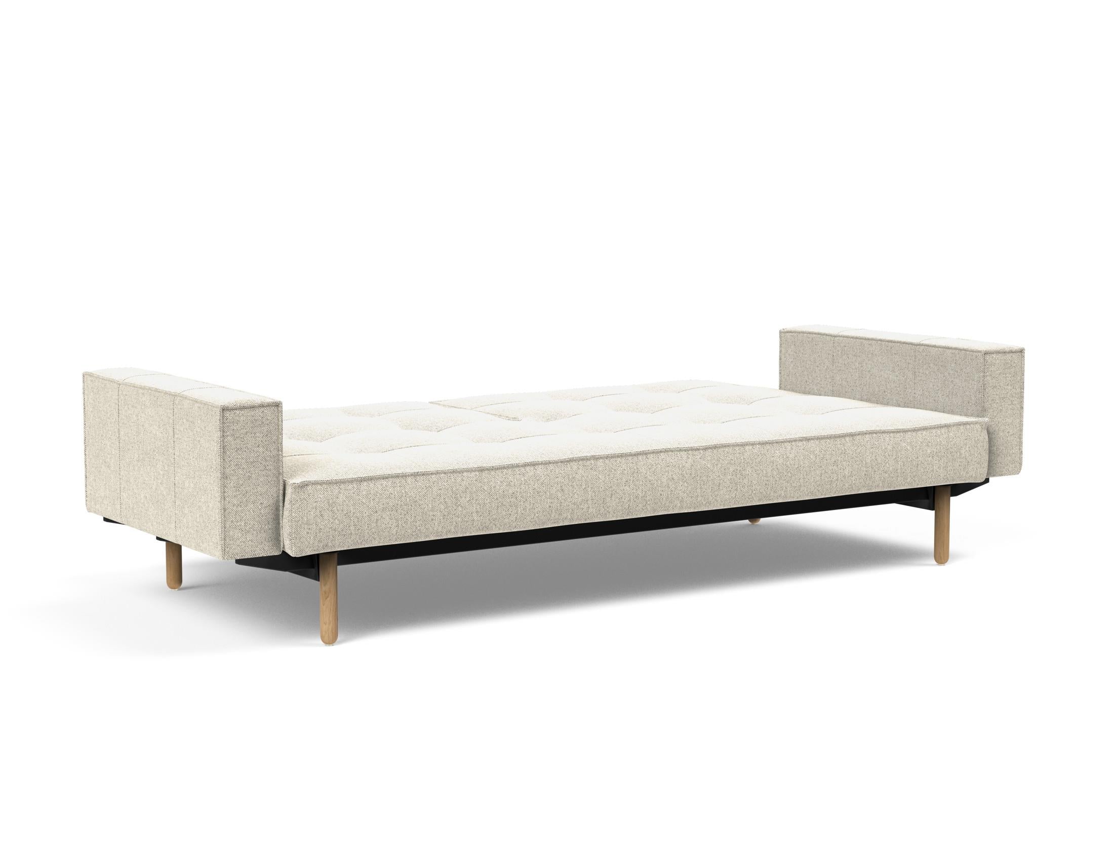 Erleben Sie das Splitback Sofabett 115 Stem von Innovation Living – ein stilvolles Schlafsofa mit Armlehnen, das Komfort und Flexibilität perfekt kombiniert.