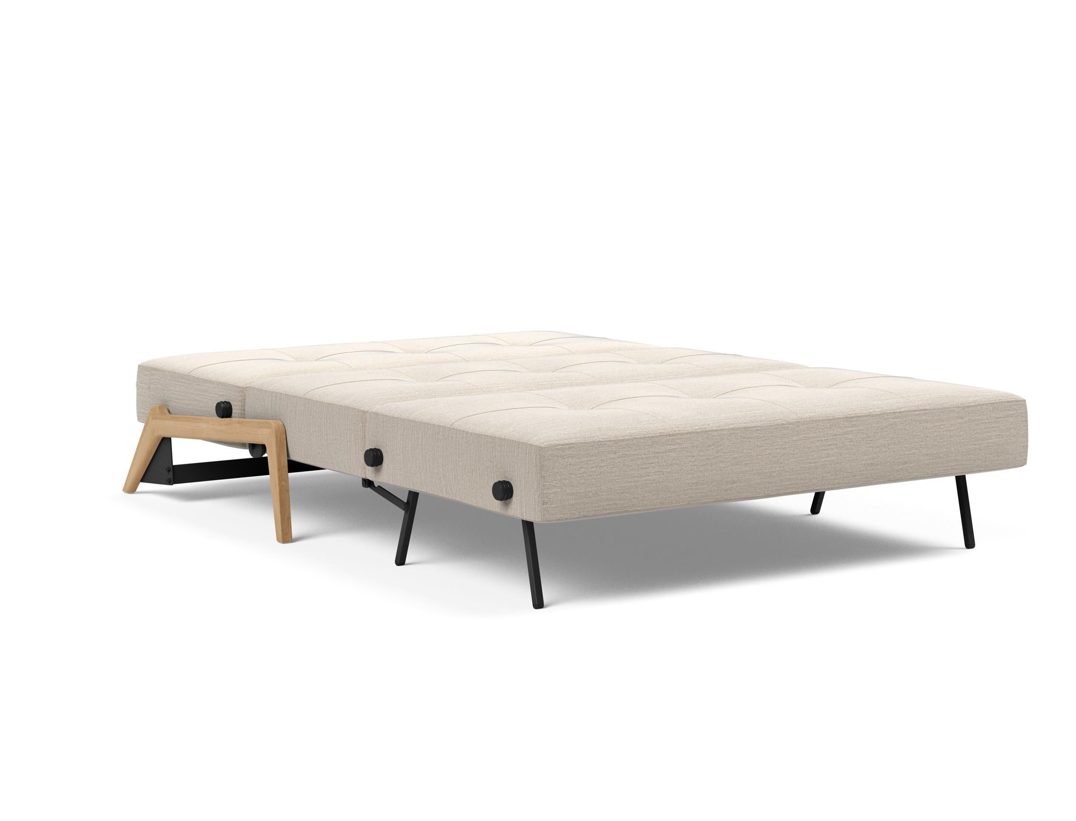 Cubed Klappsofa 140: Kompaktes Design trifft auf Funktionalität. Verwandelt sich mühelos in ein bequemes Bett und bietet praktischen Stauraum.