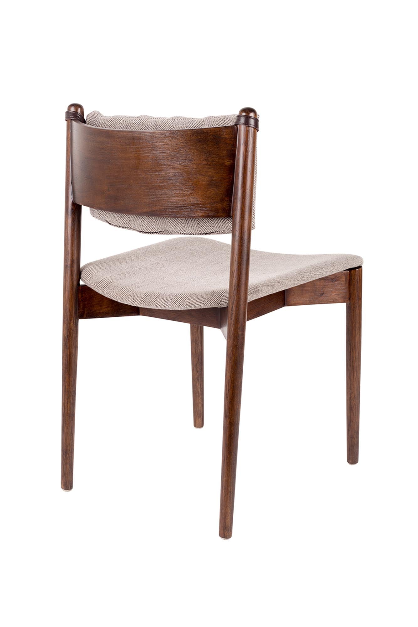 Entdecken Sie den eleganten Esszimmerstuhl Torrance von Dutchbone: Schlankes Design, gepolsterter Komfort und edler Stoffbezug für stilvolle Akzente.