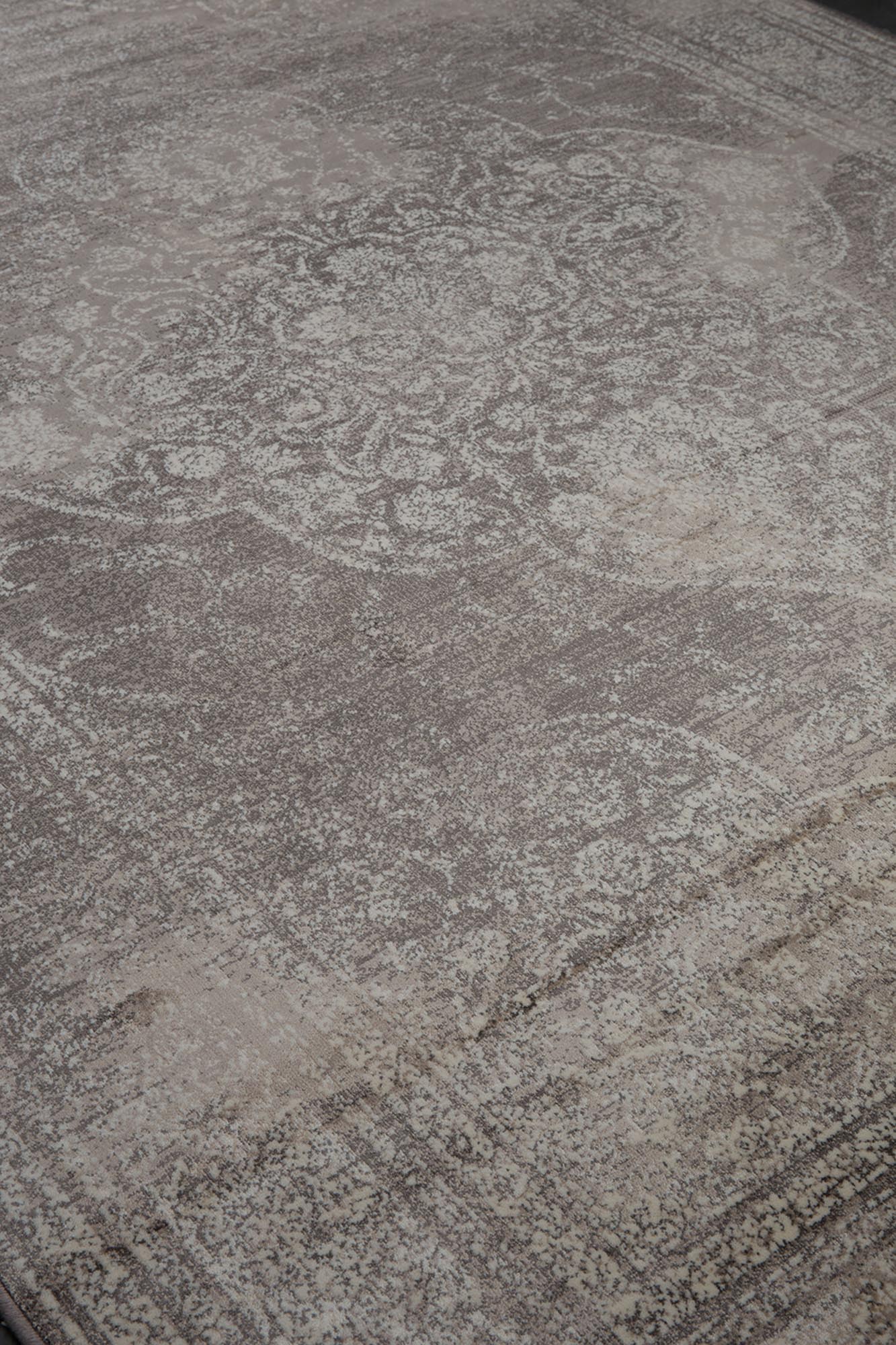 Der Dutchbone Rugged Teppich vereint Vintage-Charme mit Qualität, ideal für elegante und gemütliche Wohnräume.