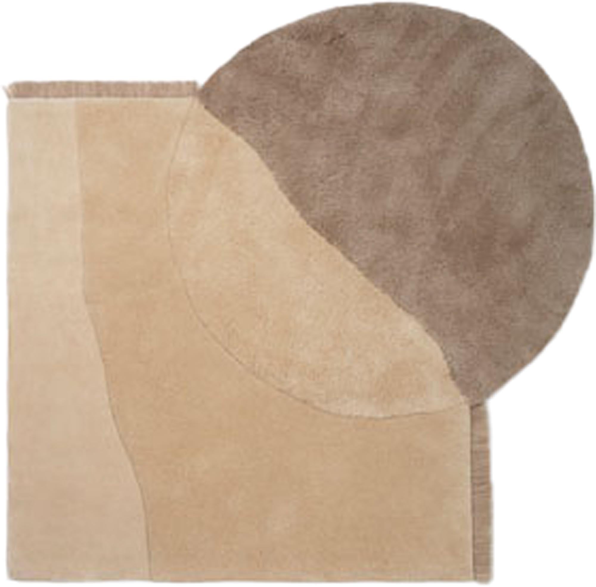 Exklusiver, handgefertigter Teppich mit geometrischen Formen, inspiriert von Luftaufnahmen, aus weicher Neuseeland-Wolle.