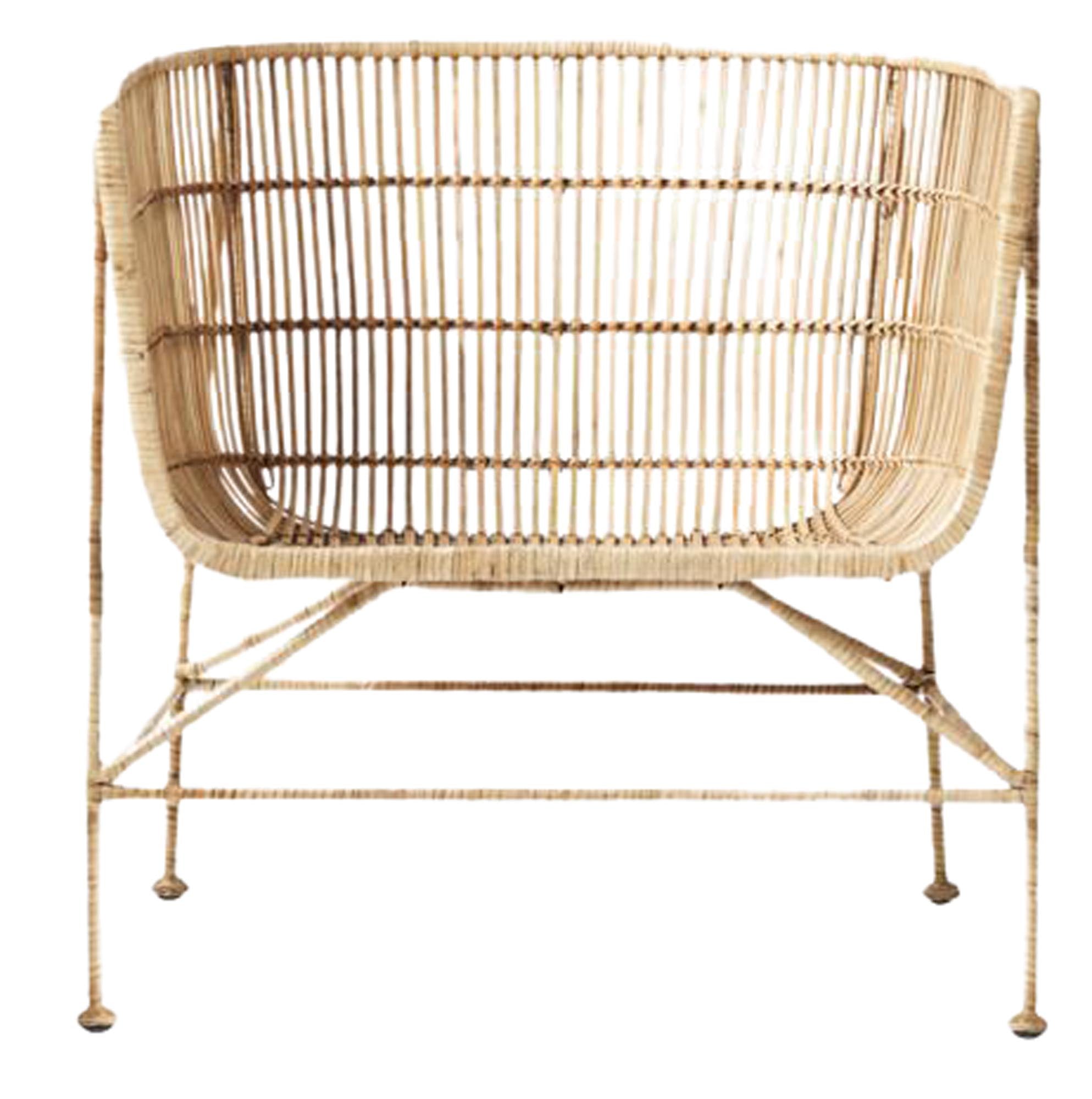 Entdecken Sie den Cuun Sessel von House Doctor – ein stilvoller Lounge-Stuhl aus Rattan und Eisen, ideal für entspannte Stunden in Ihrem Zuhause.