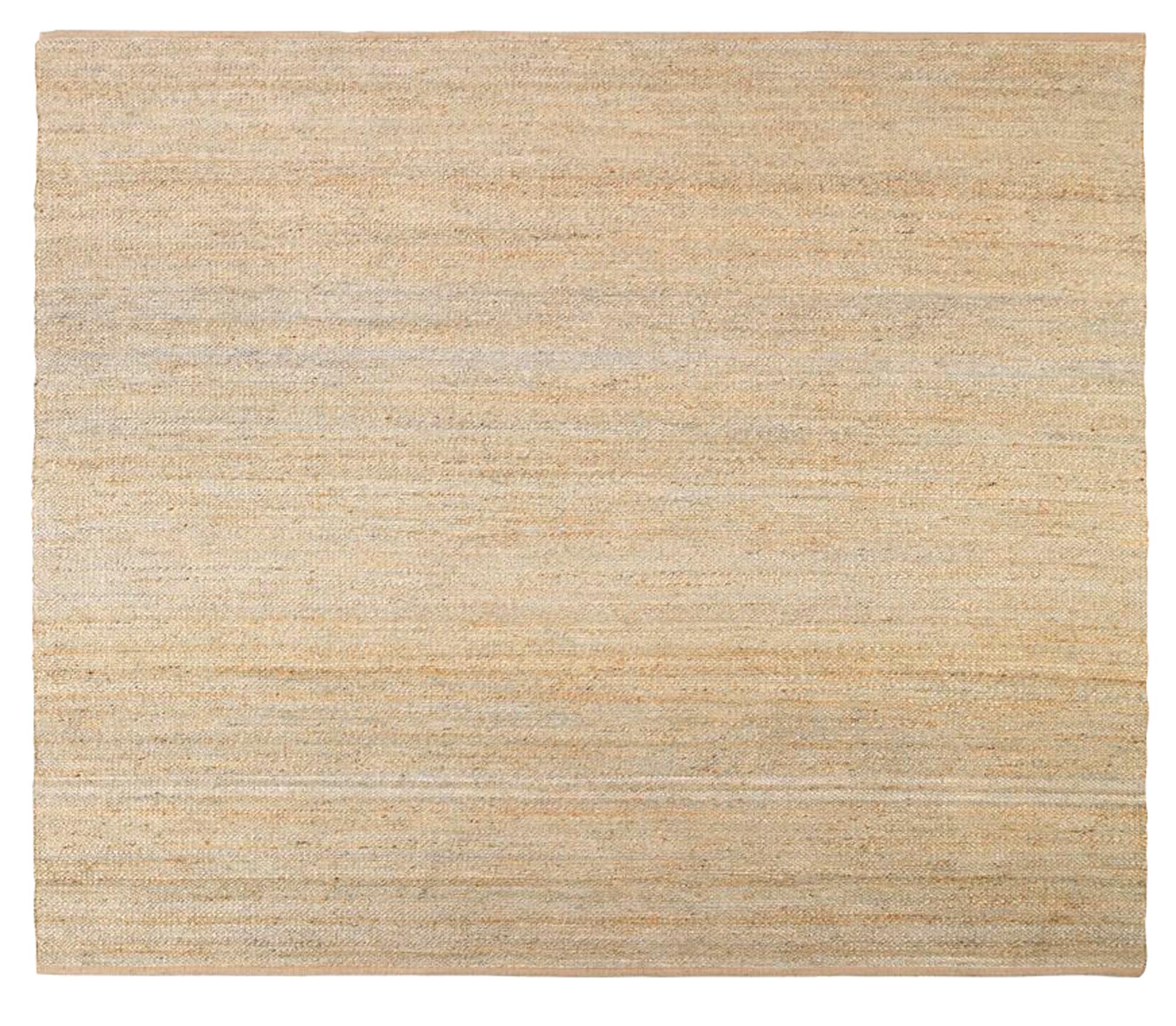 Eleganter Hempi Teppich von House Doctor in warmen Naturtönen, ideal für gemütliche und stilvolle Wohnambiente.