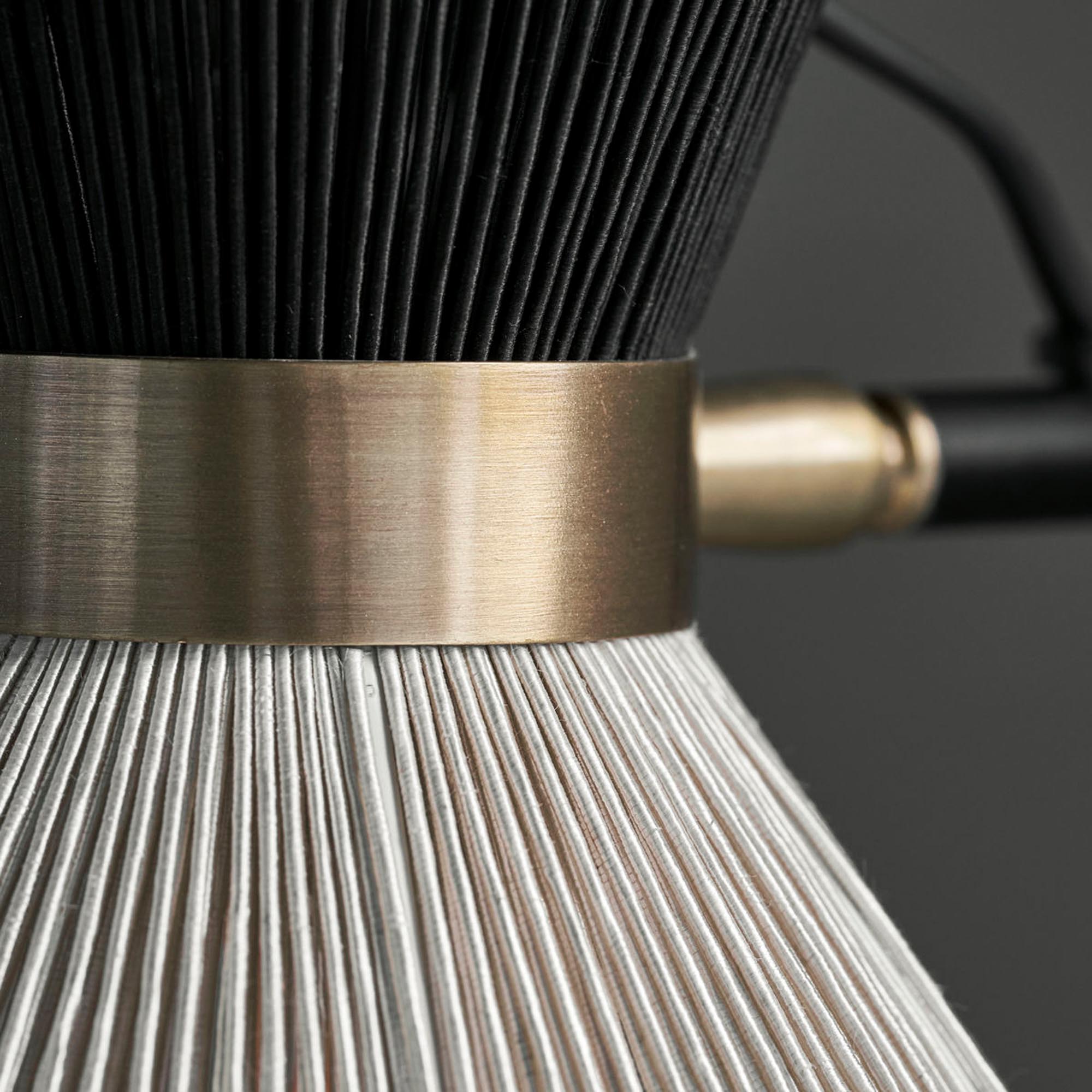 Stilvolle schwarze Wandleuchte HDCord von House Doctor für Akzente.