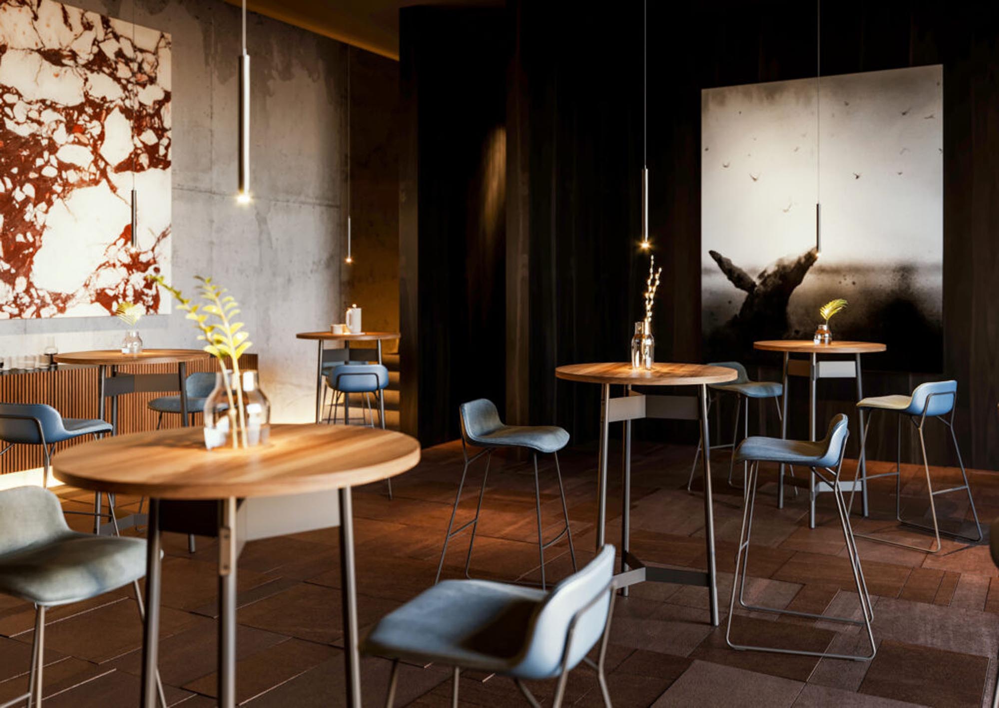 Der Bartisch Any-Up Round von Mobimex vereint modernes Design mit Funktionalität und fördert kreative Arbeitsumgebungen.