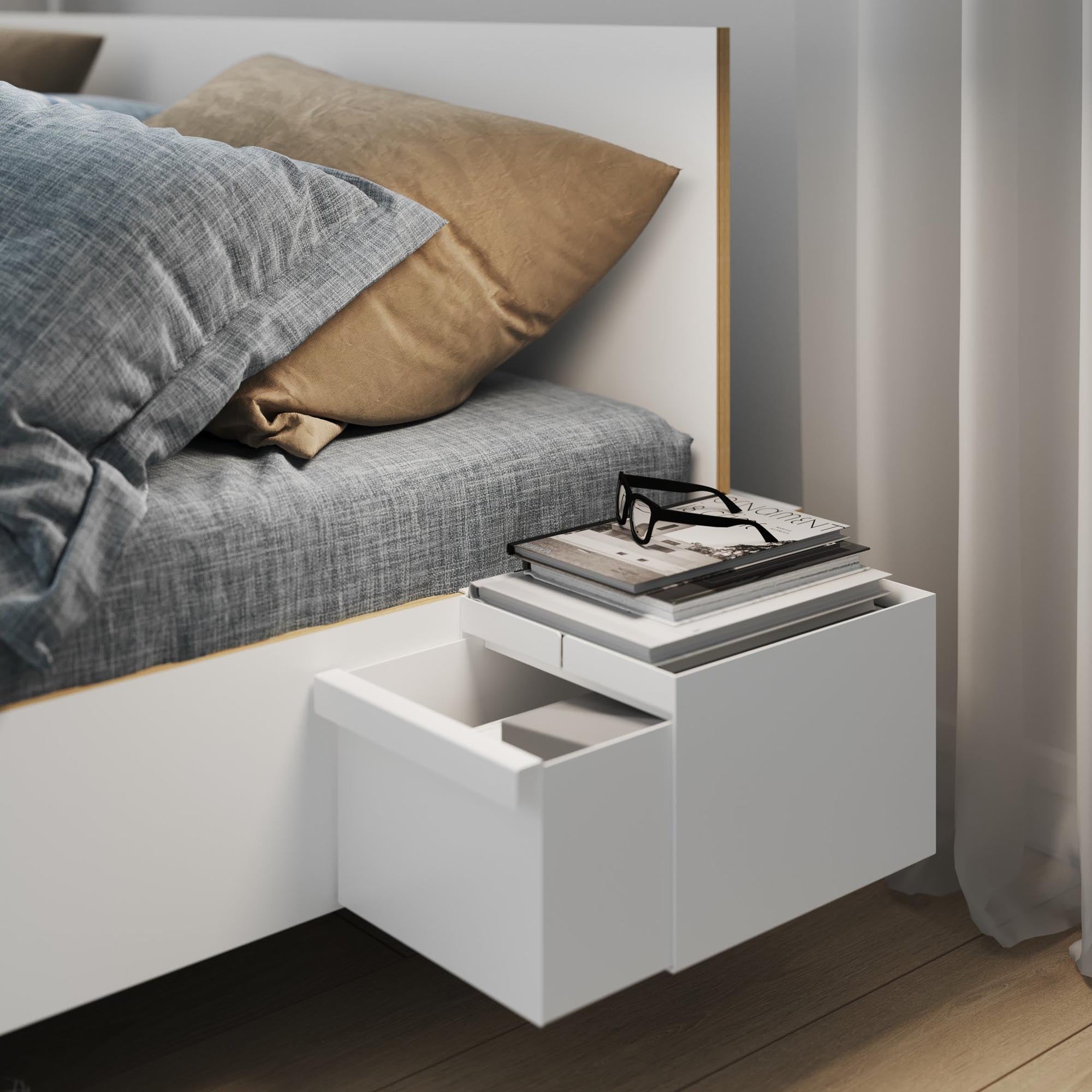 Elegante, vielseitige Bettablage in Weiss von Müller Möbelwerkstätten.