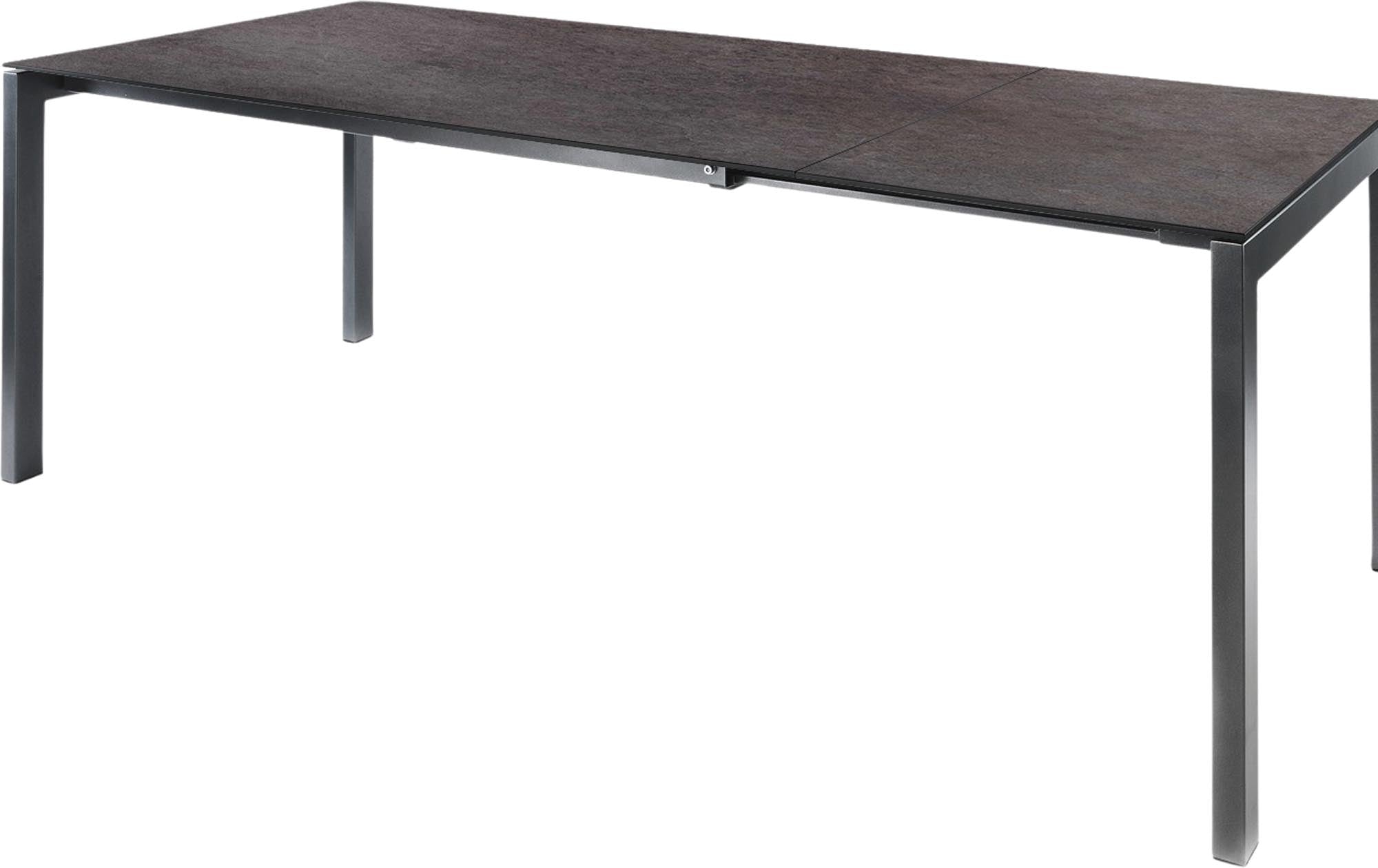 Eleganter und robuster Gartentisch aus Glasfaser, ausziehbar von 220 auf 280 cm, ideal für gesellige Abende im Freien.