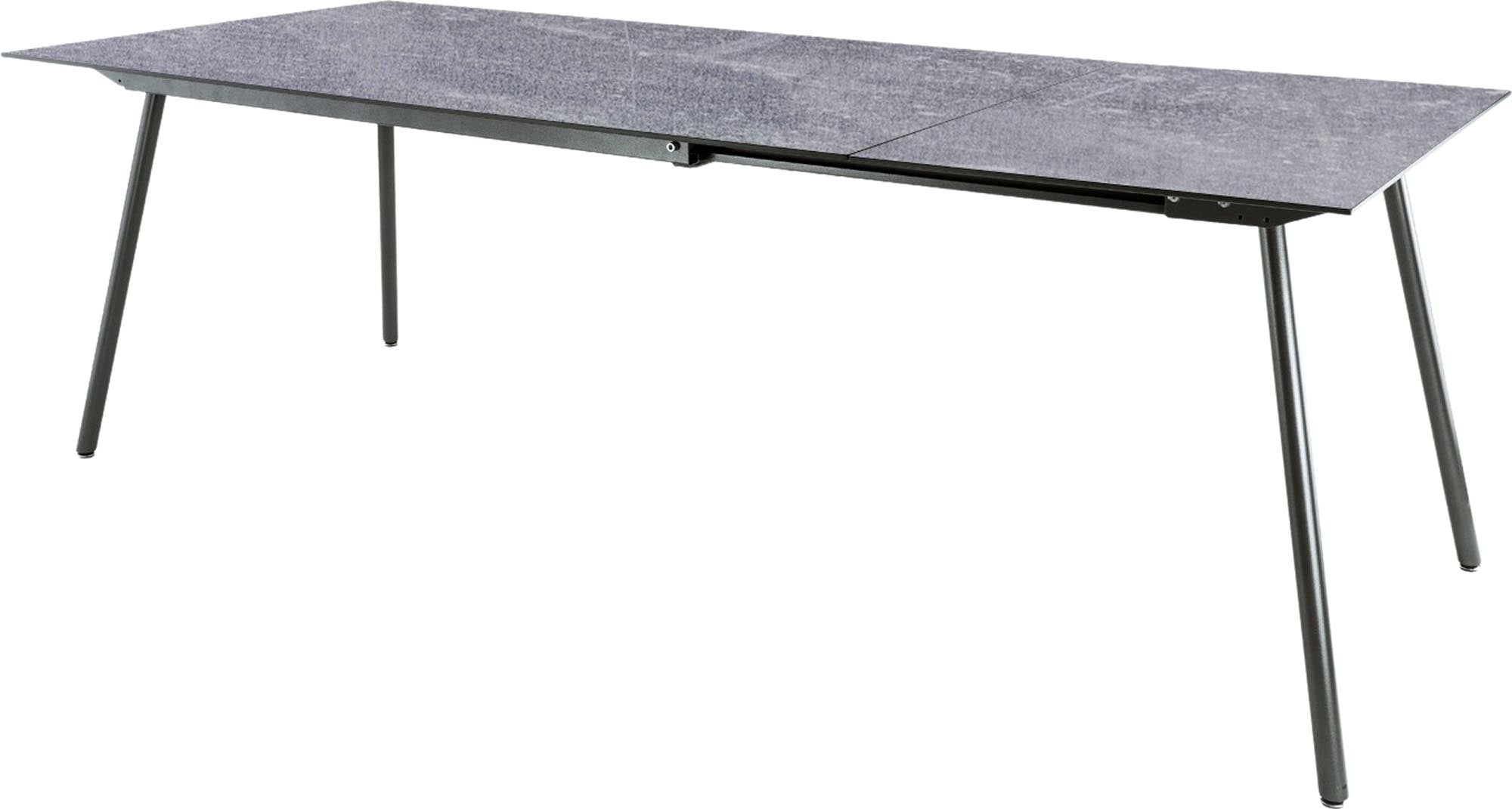 Moderner Gartentisch aus Glasfaser, ausziehbar von 160 auf 220 cm, ideal für Gartenpartys und entspannte Abende im Freien.