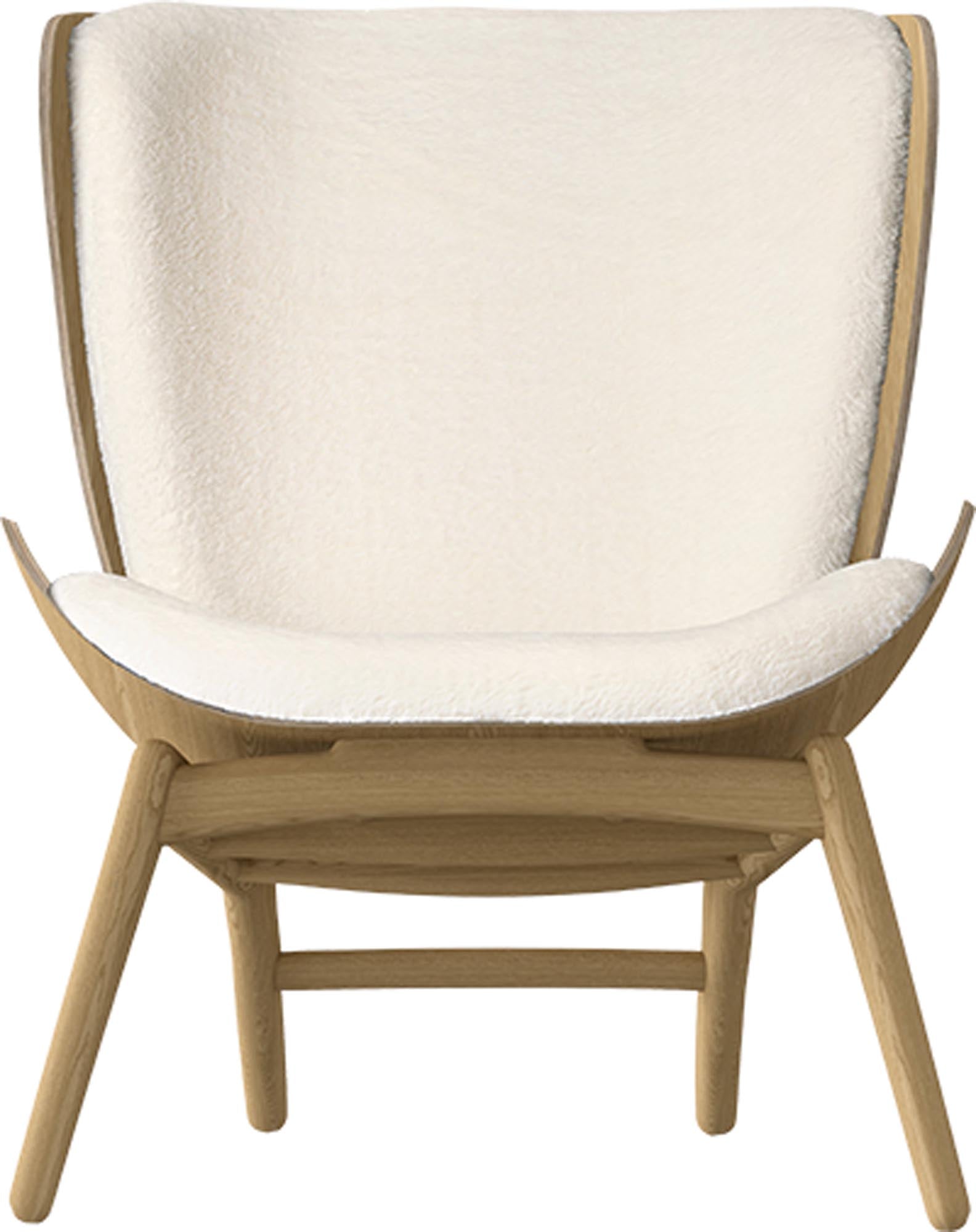 Der Reader Sessel von Umage vereint elegantes Design mit optimaler Ergonomie für entspannte Lesestunden.