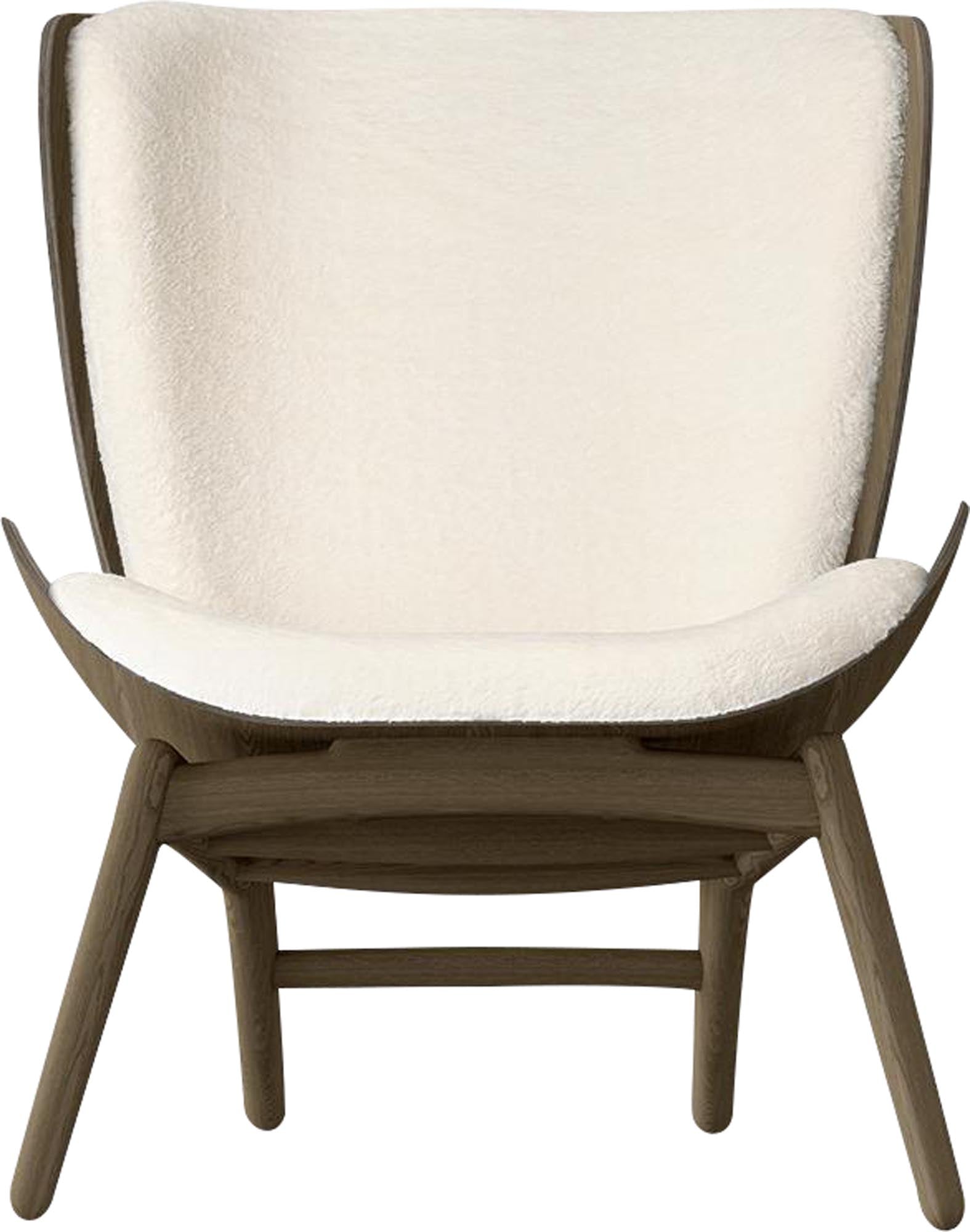 Der Reader Sessel von Umage vereint skandinavisches Design mit luxuriösem Komfort. Ideal zum Entspannen und Lesen.