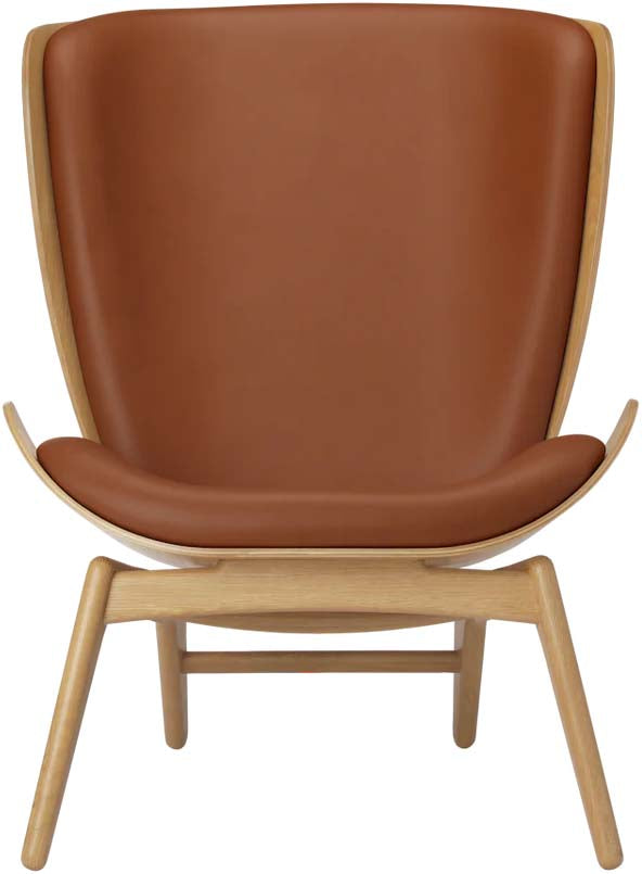 Eleganter Reader Sessel von Umage aus hochwertigem Leder und Eichenholz. Ideal zum Entspannen und Lesen in jedem Raum.