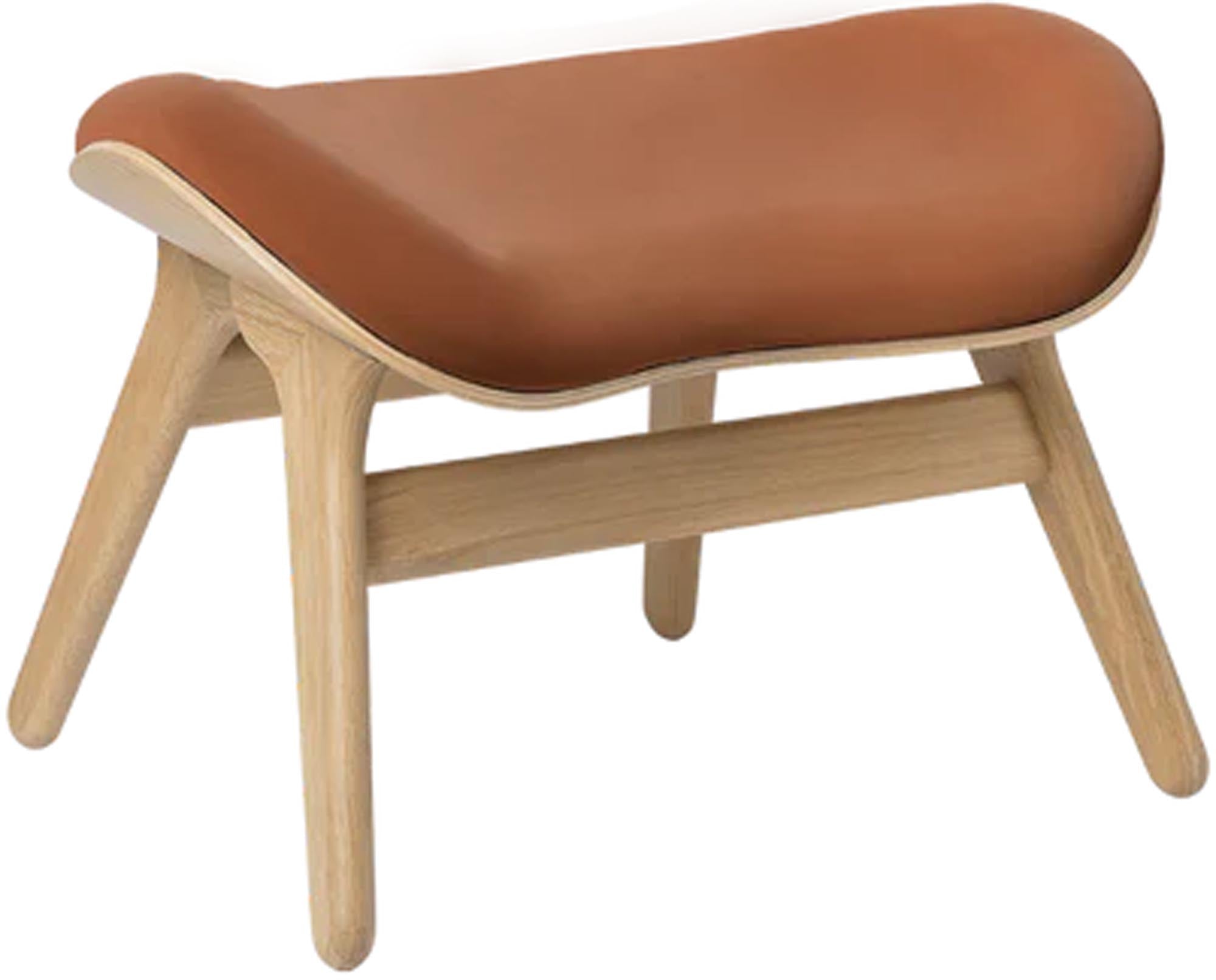 Eleganter Umage Ottoman: Perfekte Ergänzung für Ihr Leseerlebnis.