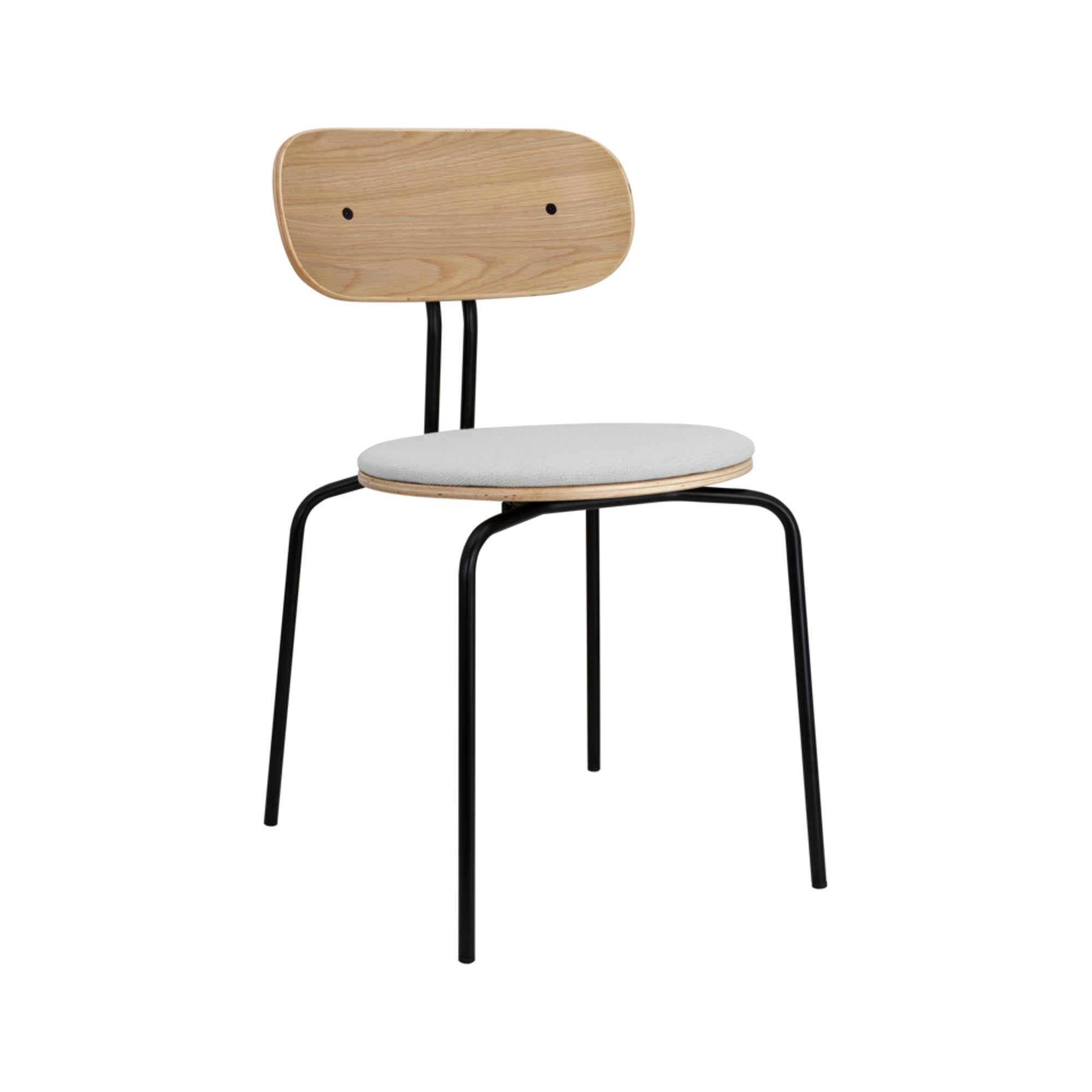 Entdecken Sie den Curious Stuhl gepolstert von Umage: Skandinavisches Design trifft auf Komfort und Vielseitigkeit für Ihr Zuhause.