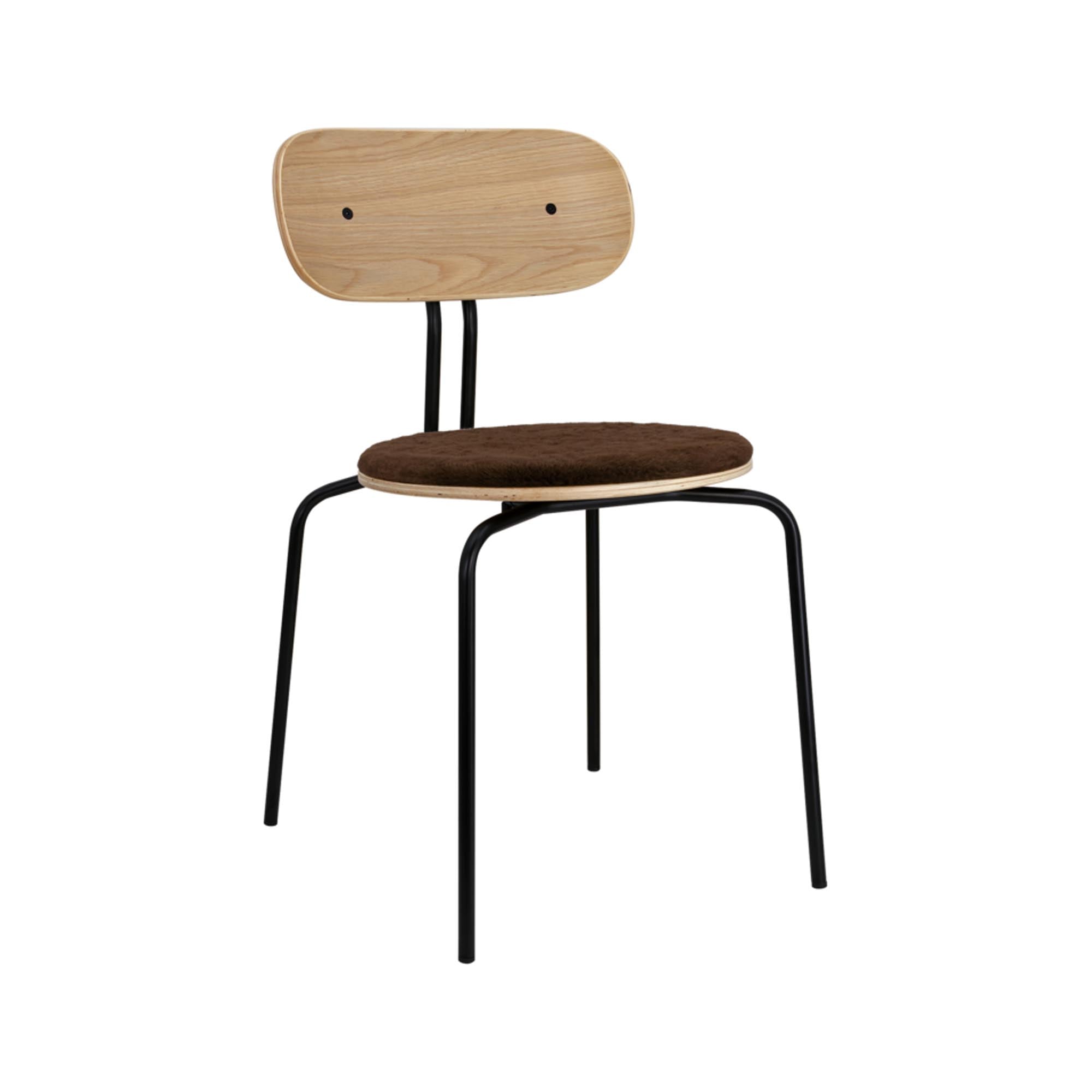 Curious Stuhl von Umage: Elegante Polsterung für stilvolles Sitzen.