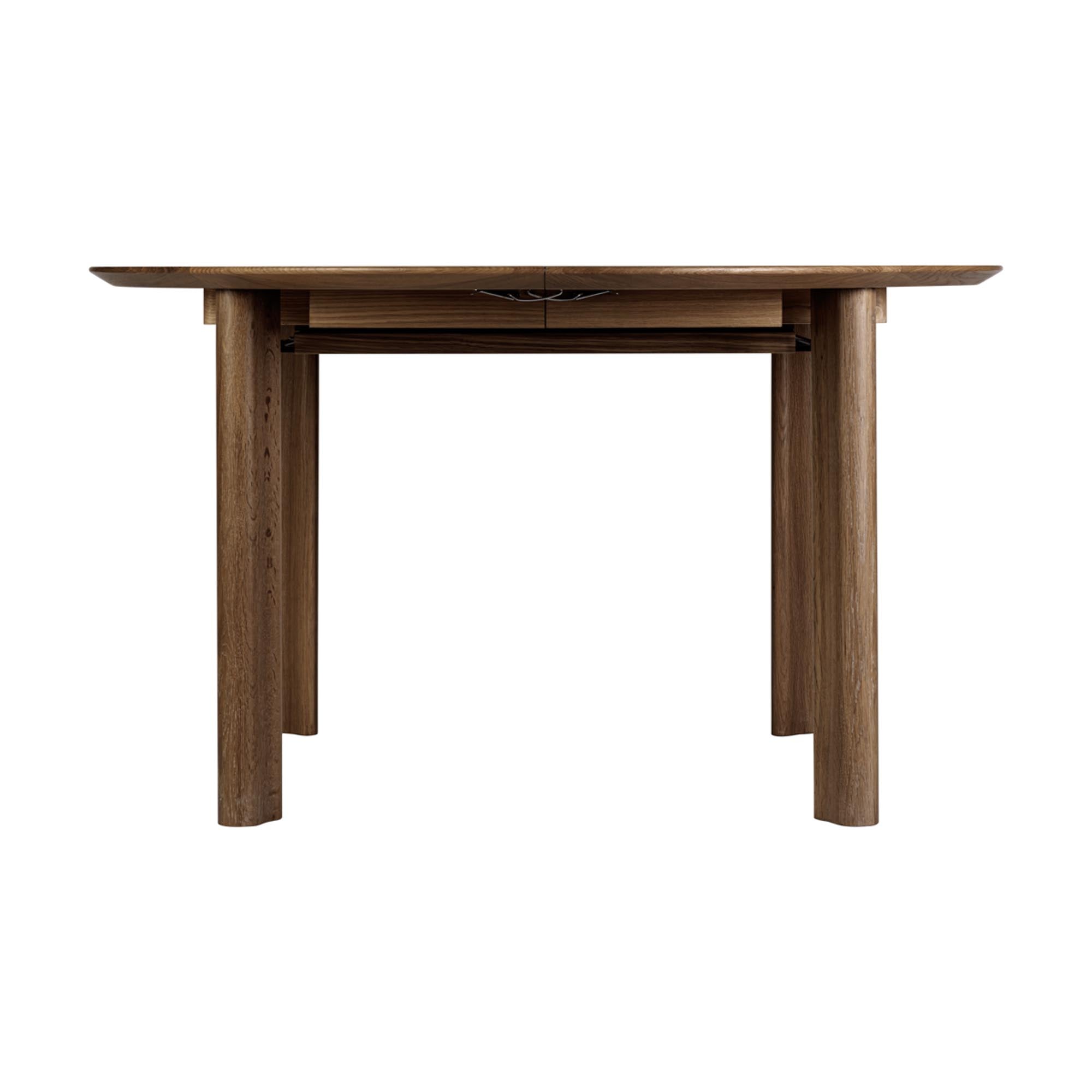 Stilvoller Umage Comfort Circle Tisch, erweiterbar für grosse Feiern.