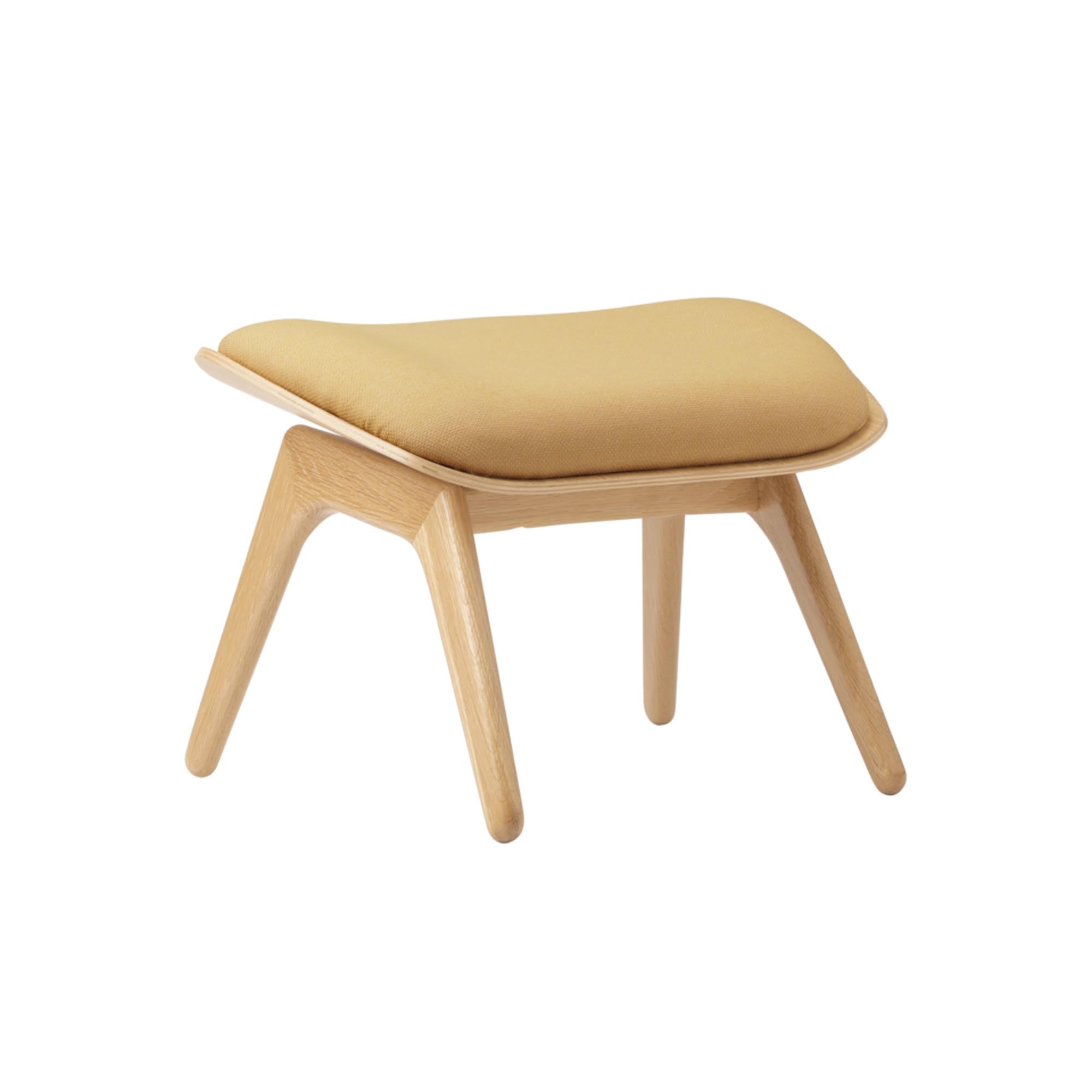 Entdecken Sie die stilvolle Reader Ottoman von Umage mit eleganten Eichenbeinen und skandinavischer Farbpalette für Ihr Zuhause.